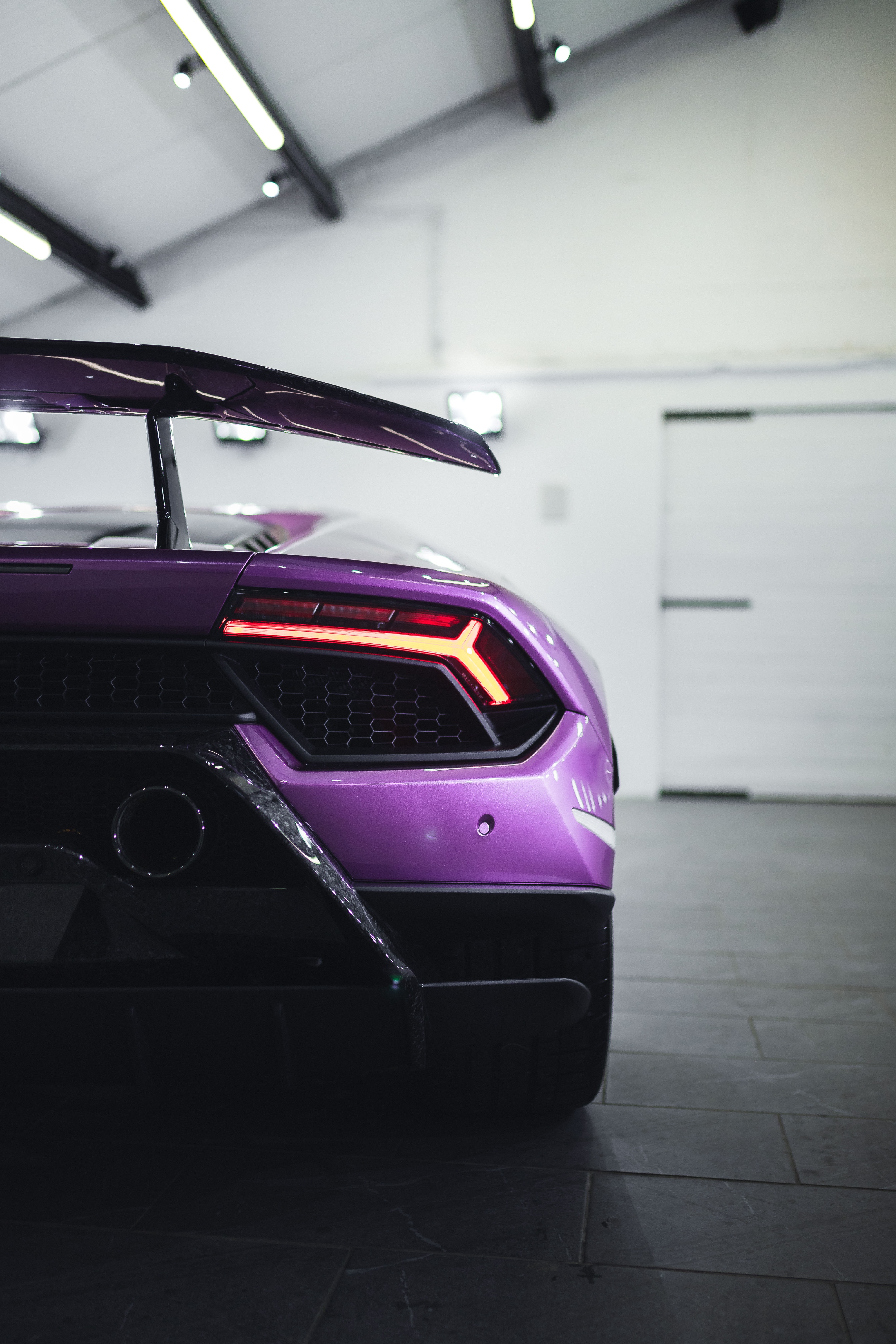 Mobile wallpaper: Supercar, Purple, Sports Car, Lamborghini, Sports, Violet, Cars, Car, Back View, Rear View, 124634 download the picture for free