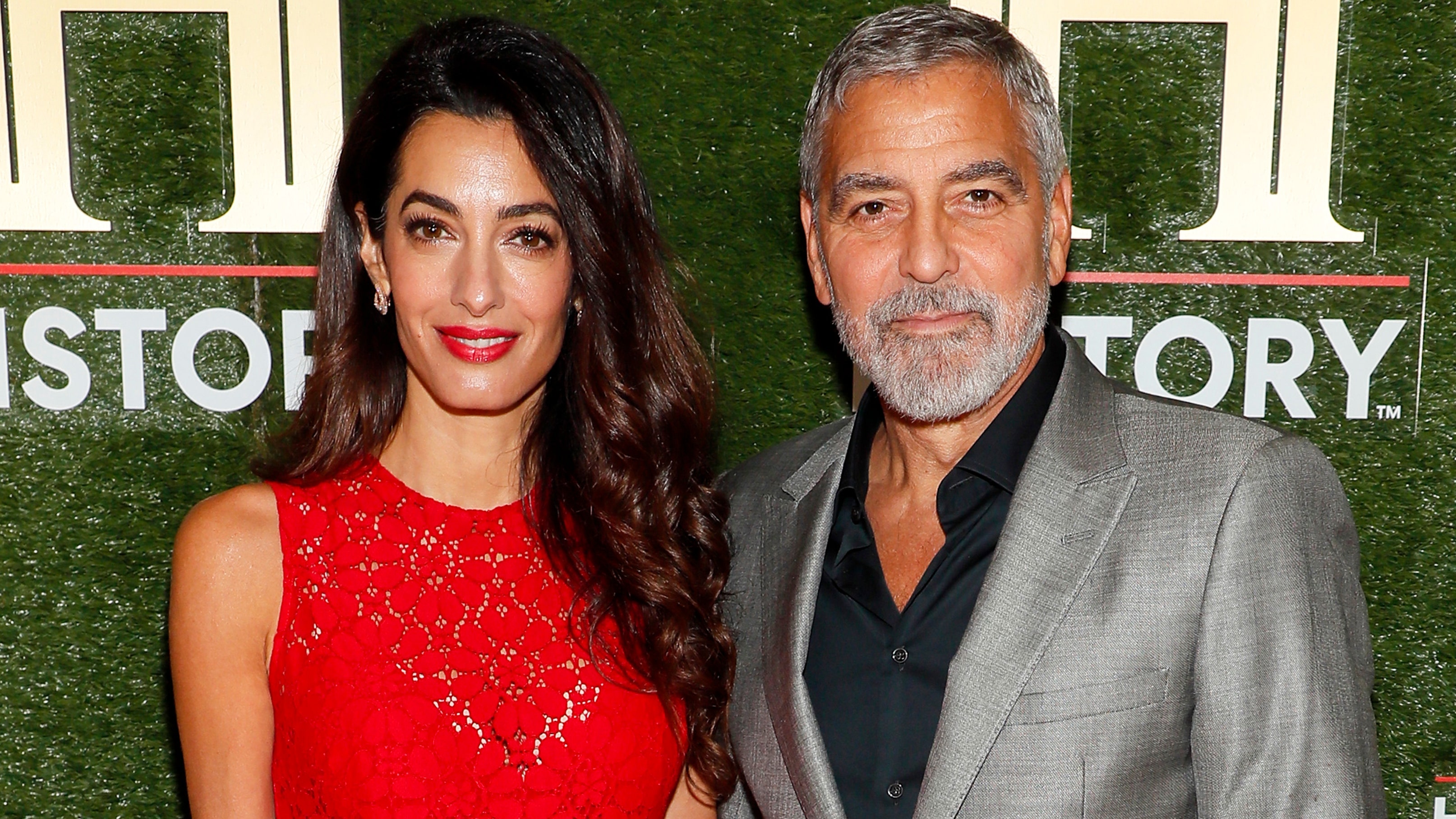 Amal Clooney Wore a Sheer Red Jumpsuit That Will Make You Want to Stop Tailoring Your Pants—See Pics