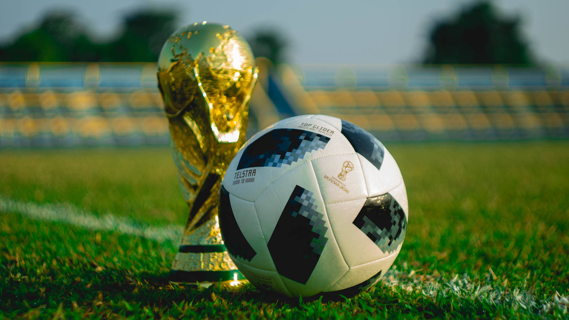 Download World Cup Gold Trophy And Football Wallpaper