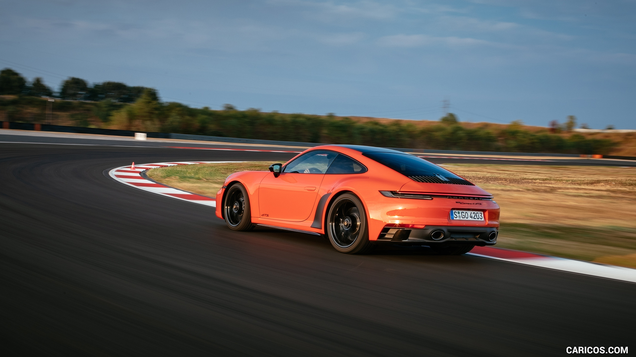 2022 Porsche 911 Carrera 4 GTS (Color: Lava Orange) Three Quarter