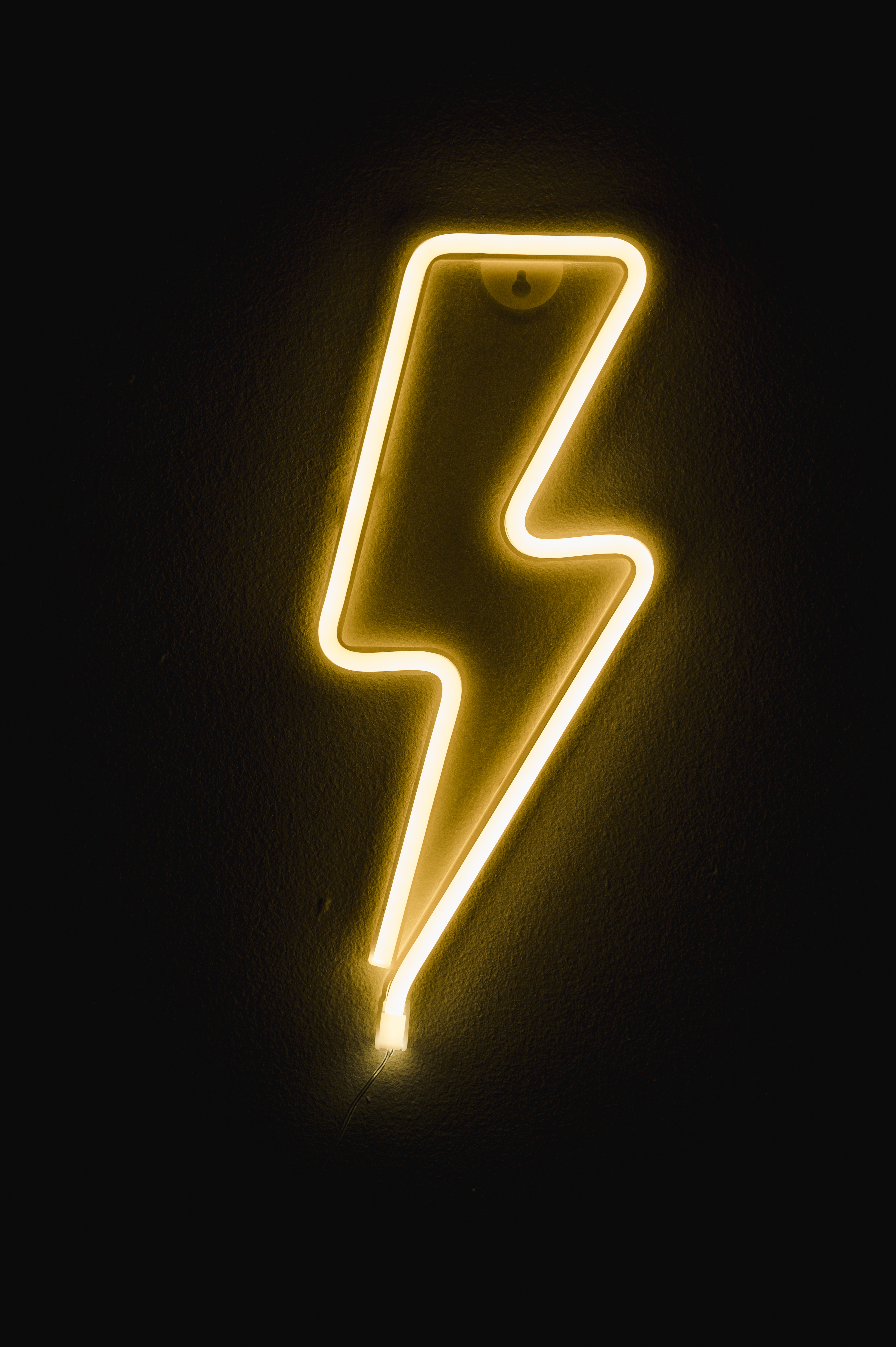 A Lightning Bolt Shaped Neon Sign · Free