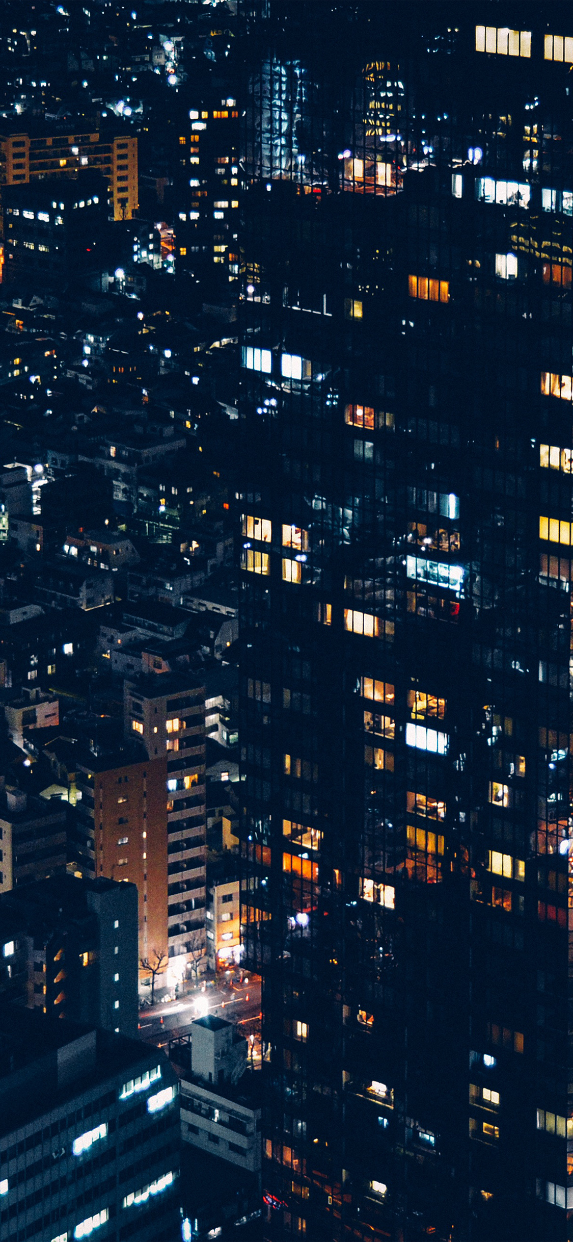 iPhone X wallpaper. city night lights building pattern