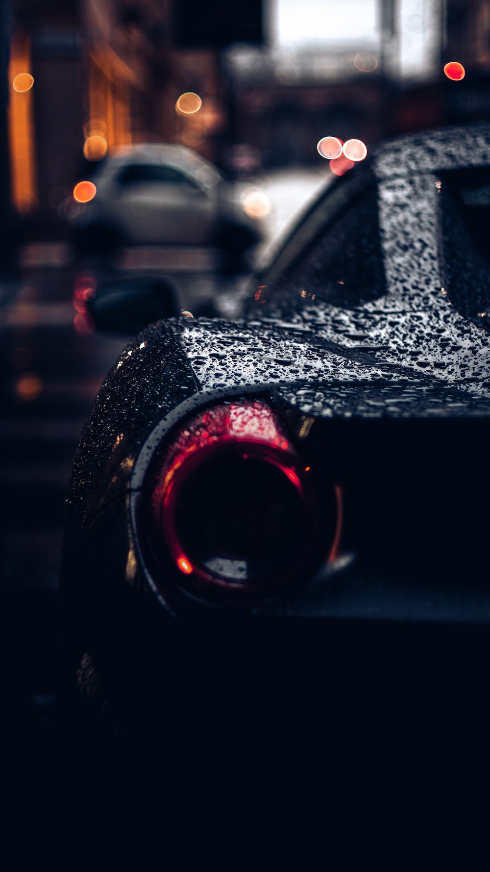 red and black car side mirror photo