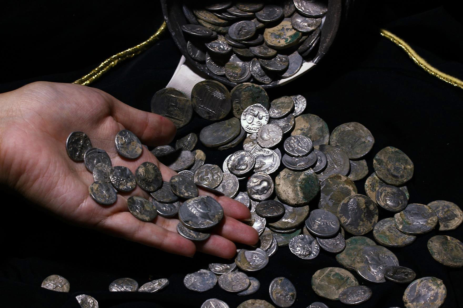 More than 650 silver Roman coins found in a jug in Turkey