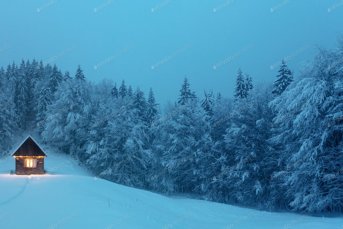 Fantastic landscape with snowy house photo by ivankmit on Envato Elements