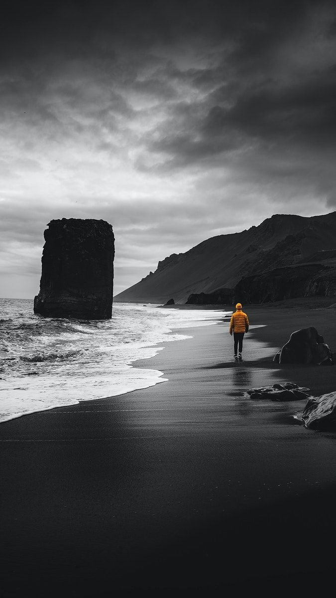 Man walking along a black beach in Iceland mobile phone wallpaper. premium image by ra. Beach phone wallpaper, Beautiful wallpaper background, Night sky photo