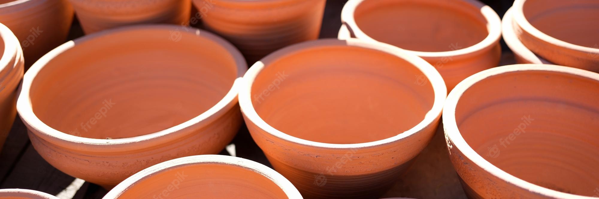 Premium Photo. Lot of clay pots on street background closeup georgian culture concept