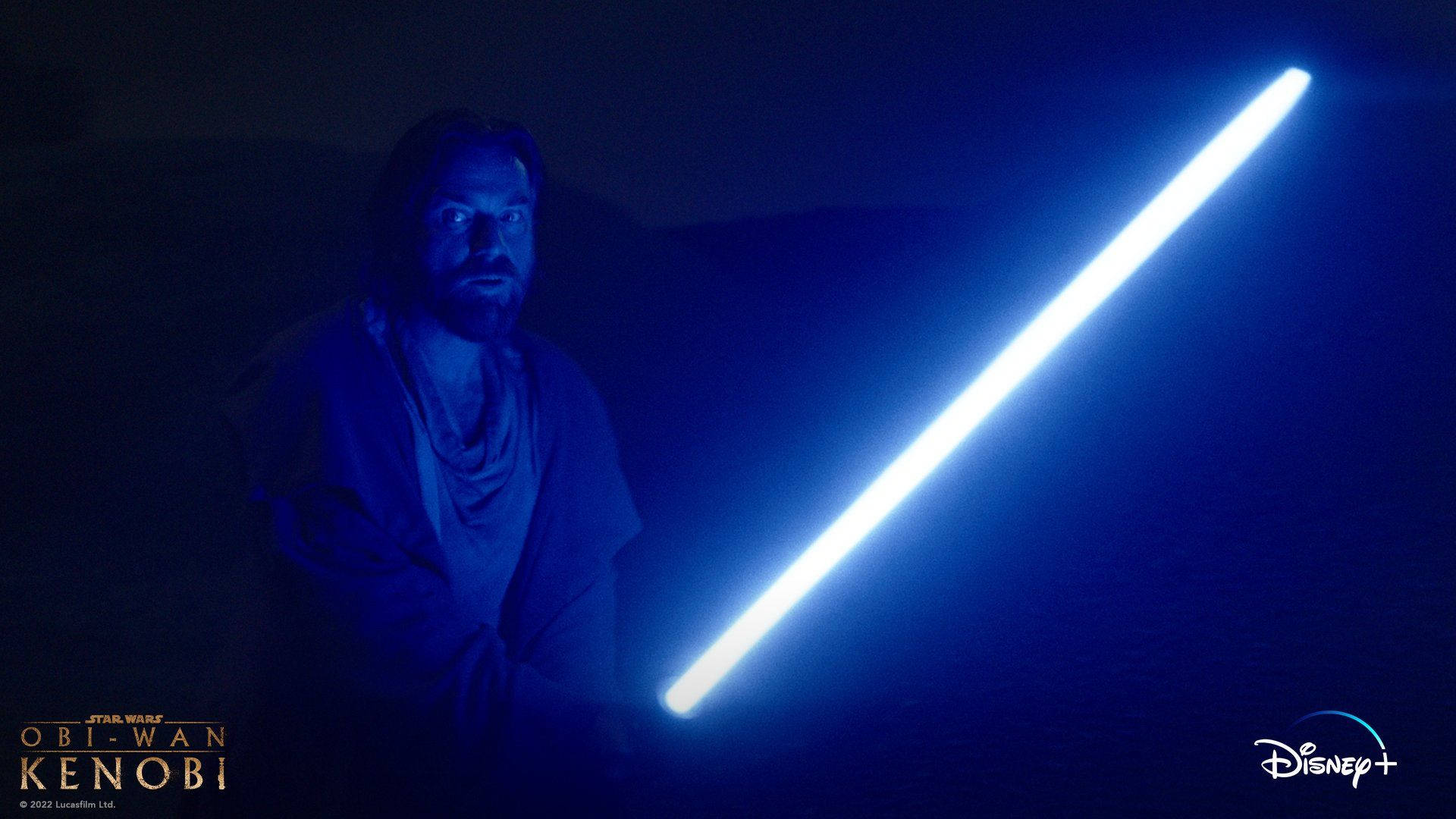 Download Obi Wan Kenobi Glowing Lightsaber Wallpaper