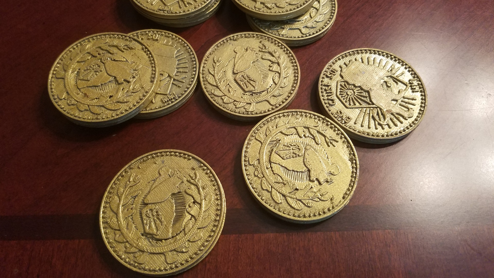 Maker 3D prints the gold coins and blood oath marker from John Wick