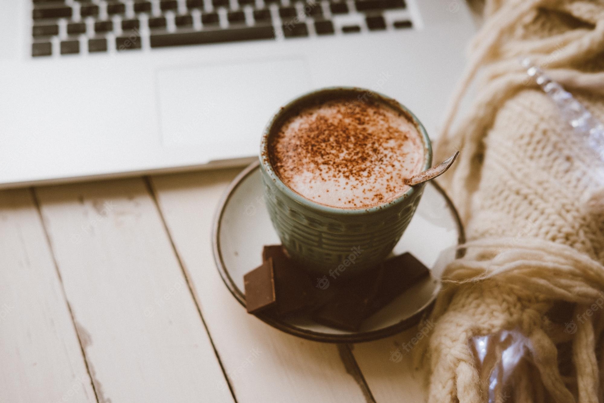 Premium Photo. Cocoa with laptop cozy winter home warm background
