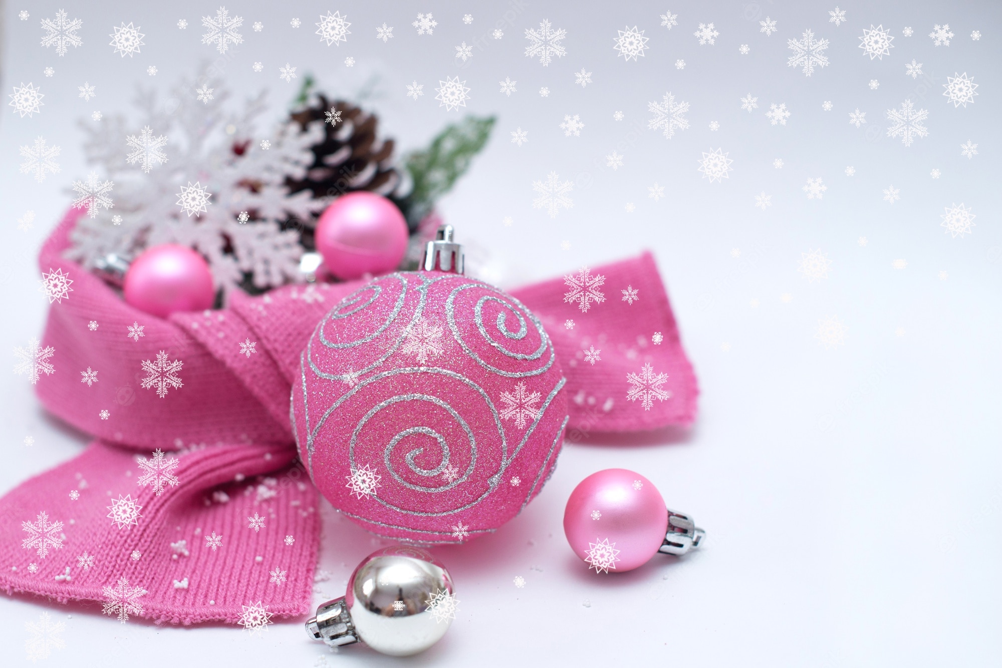 Premium Photo. Christmas background with spruce branches and pink christmas tree toys
