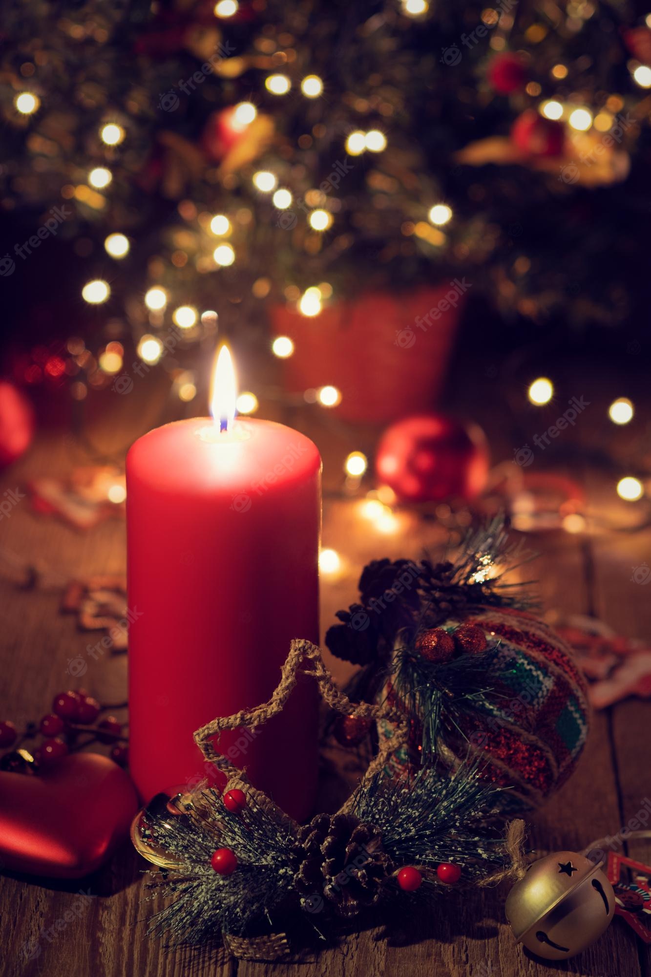 Premium Photo. Candle and toys on christmas eve. holiday card for the new year