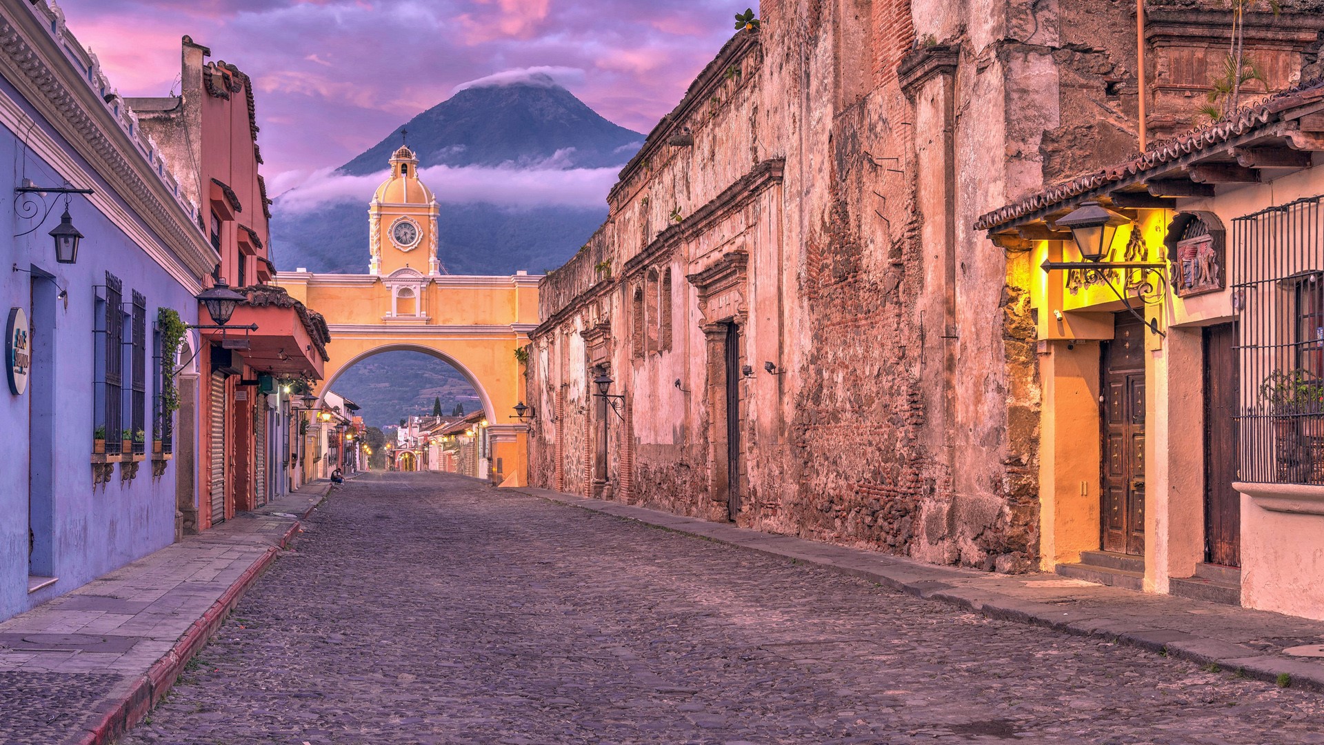 The Santa Catalina Arch (Arco de Santa Catalina) at sunrise, Antigua, Guatemala. Windows 10 Spotlight Image
