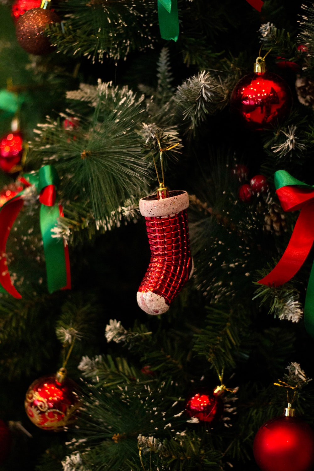 green and red christmas tree with baubles photo