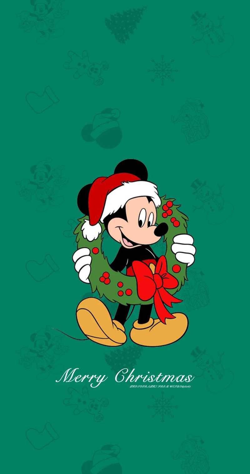 Download Disney Christmas Mickey With Wreath Wallpaper