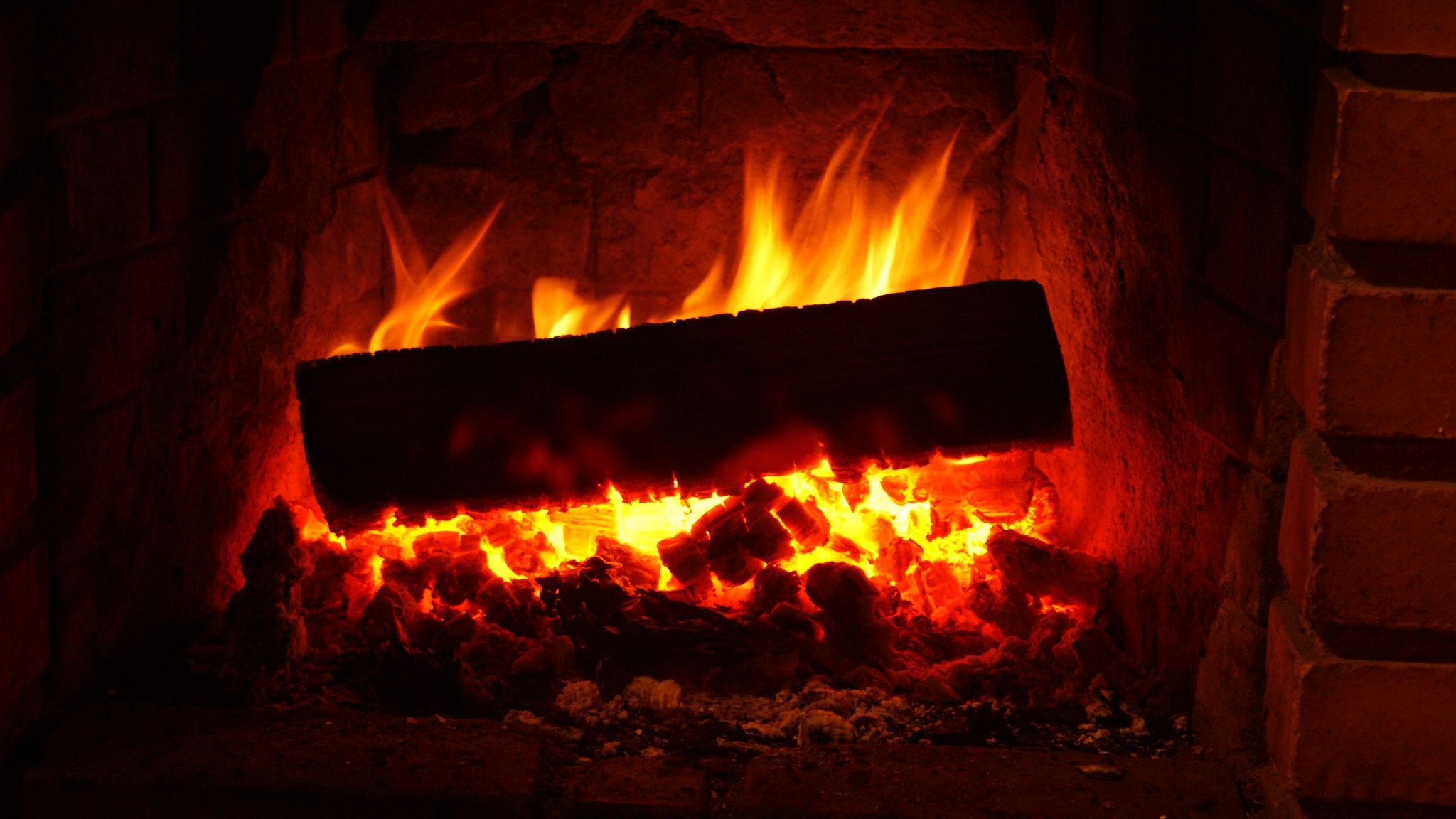 Download wallpaper 2048x1152 fireplace, wood, embers, fire ultrawide monitor HD background