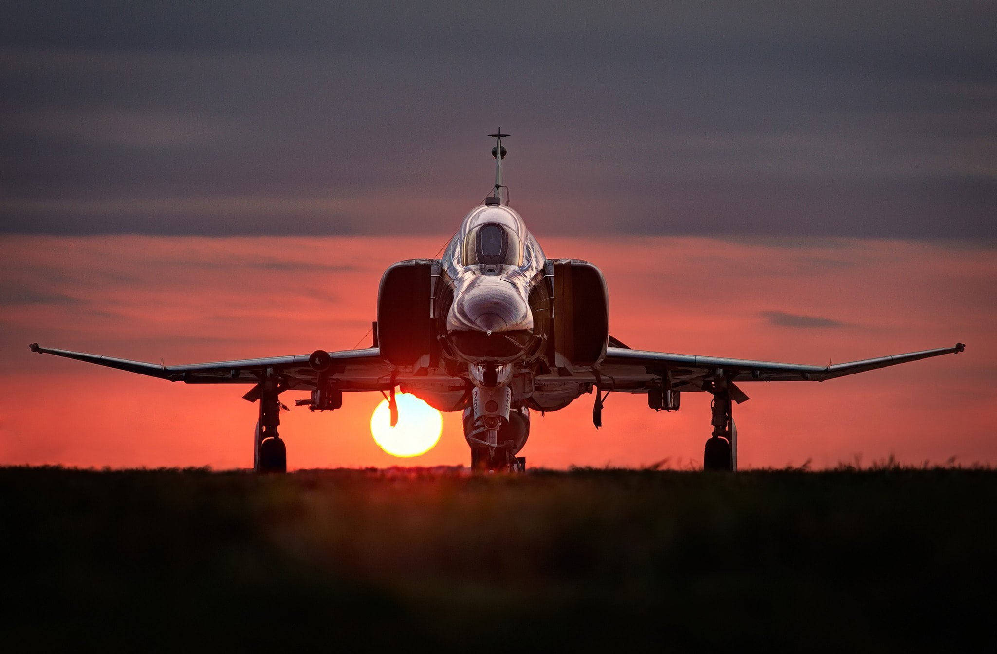 Download Sunset Behind A Military Aircraft Desktop Wallpaper