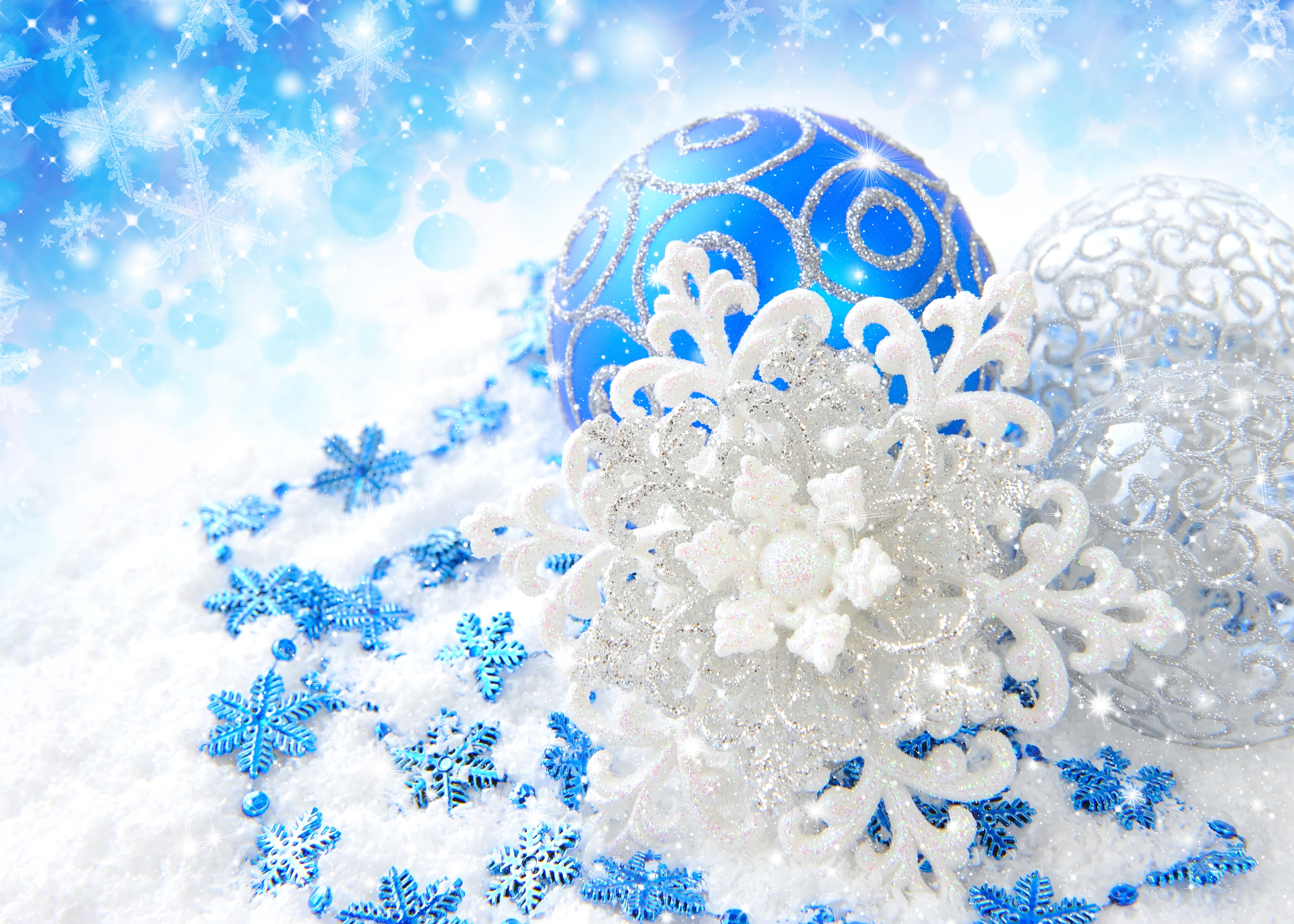 Beautiful Christmas balls with snowflakes on a blue background for New Year Desktop wallpaper 1600x900