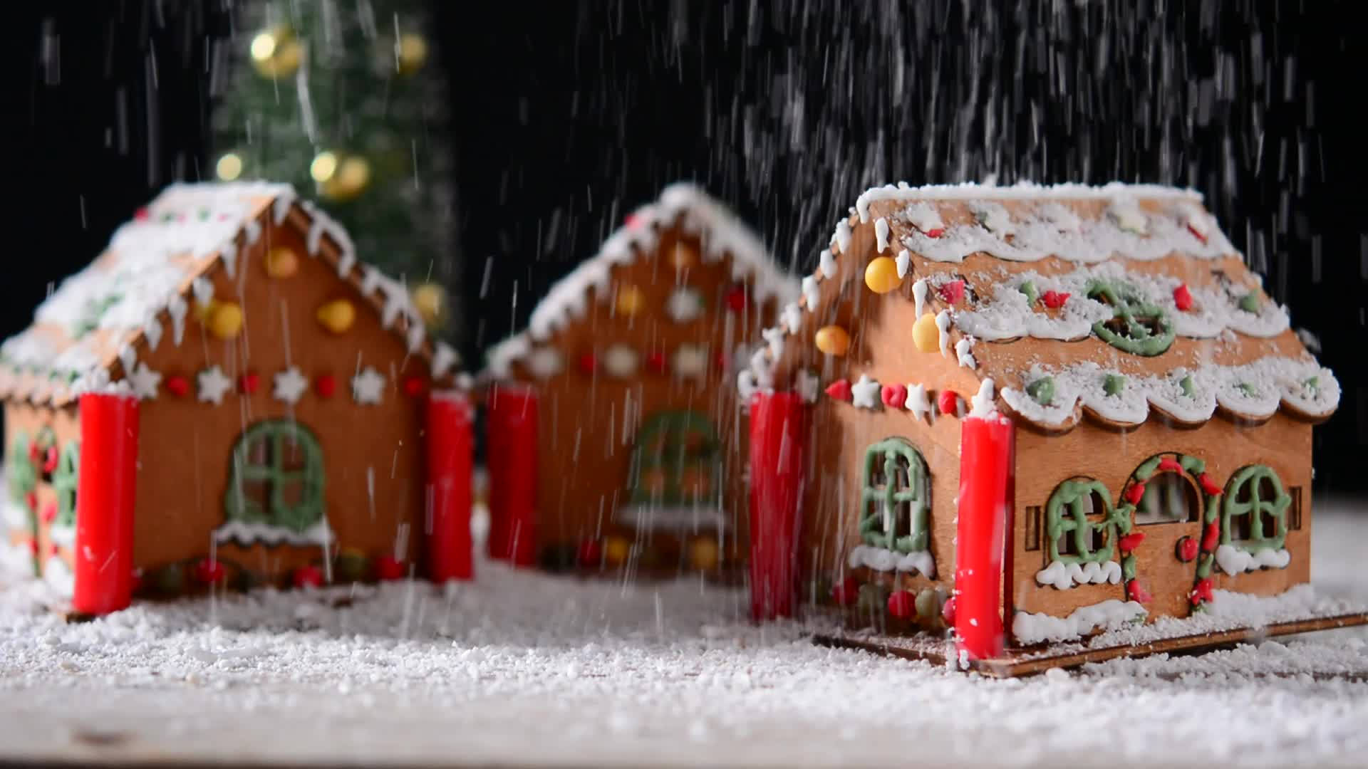 Download Enchanting Snowy Gingerbread House Nestled in a Christmas Fantasy. Wallpaper