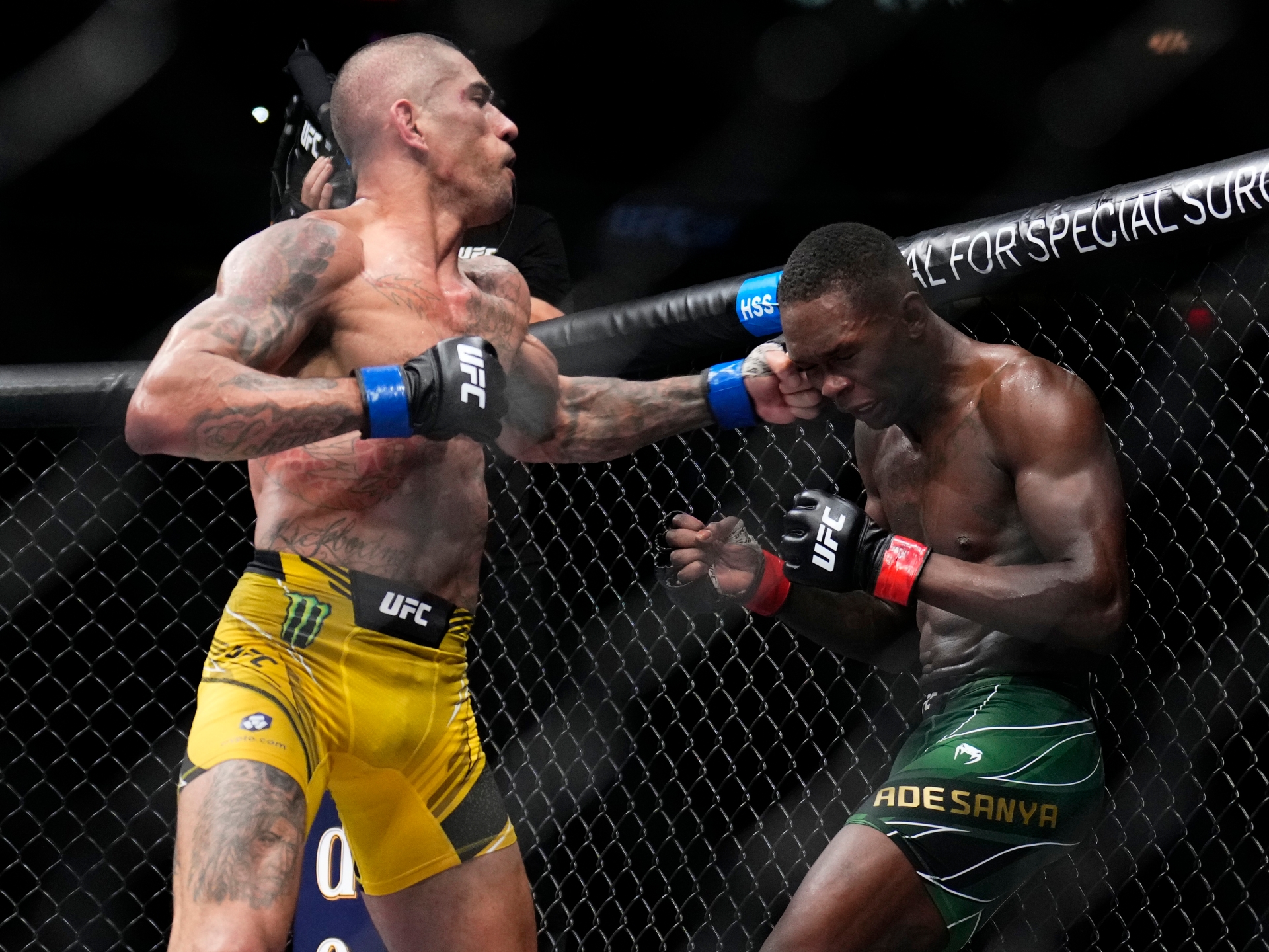 Alex Pereira KNOCKS OUT Israel Adesanya again to become middleweight champion at UFC 281 after previously beating 'Stylebender' twice in kickboxing rivalry that included brutal finish