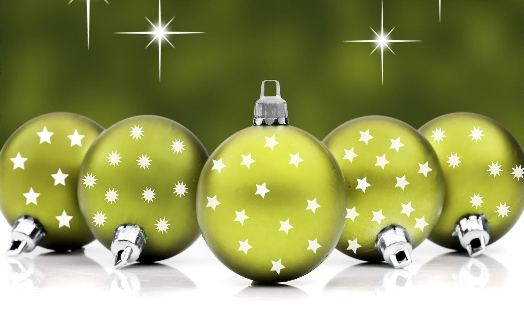 Green Christmas balls full with stars winter holiday
