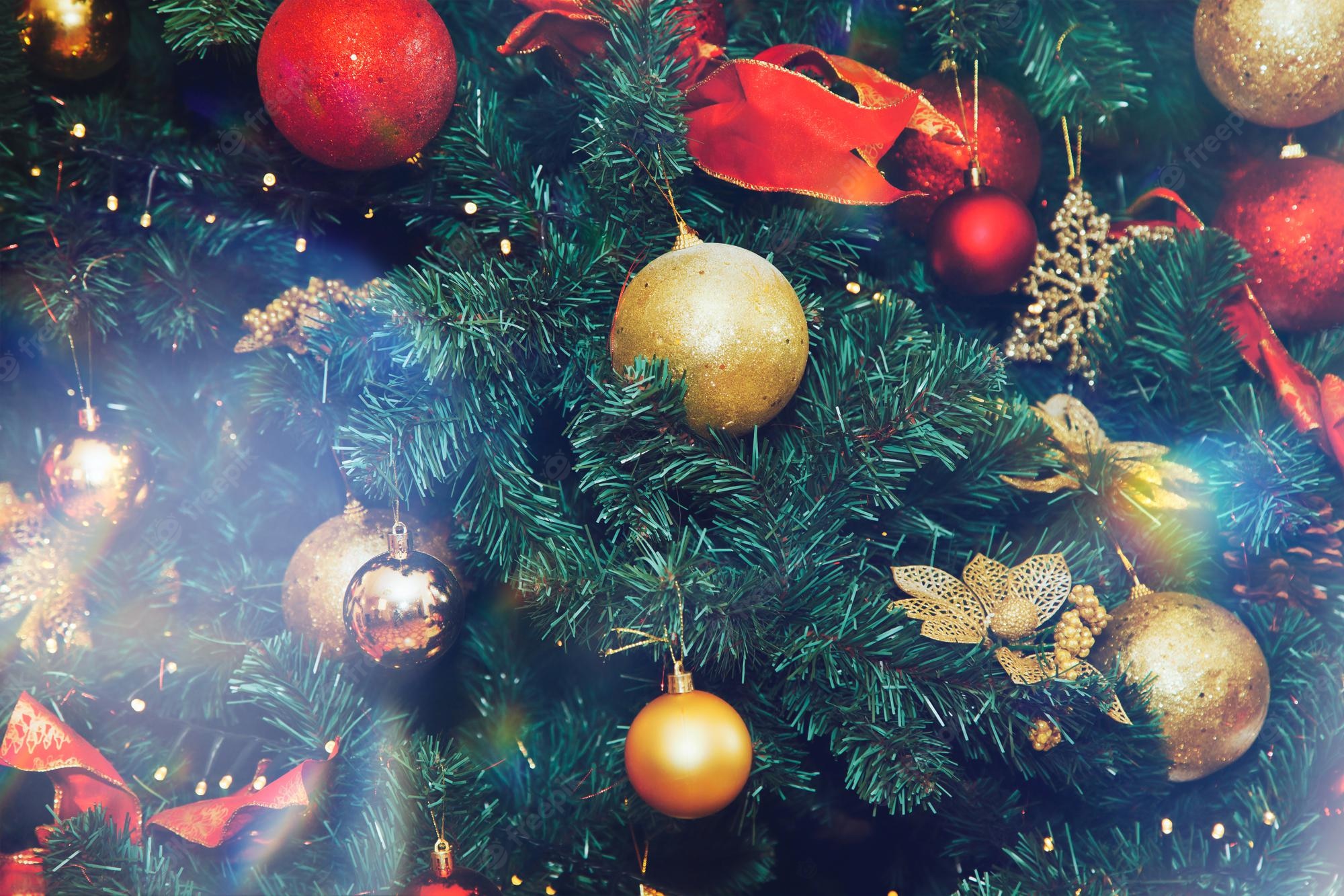 Premium Photo. Close Up Christmas Holiday Background Of Decorated Tree With Christmas Balls And Toys. Concept Of Celebrating Happy New Year. Decor Or In Home Interior. Copy Space For Site