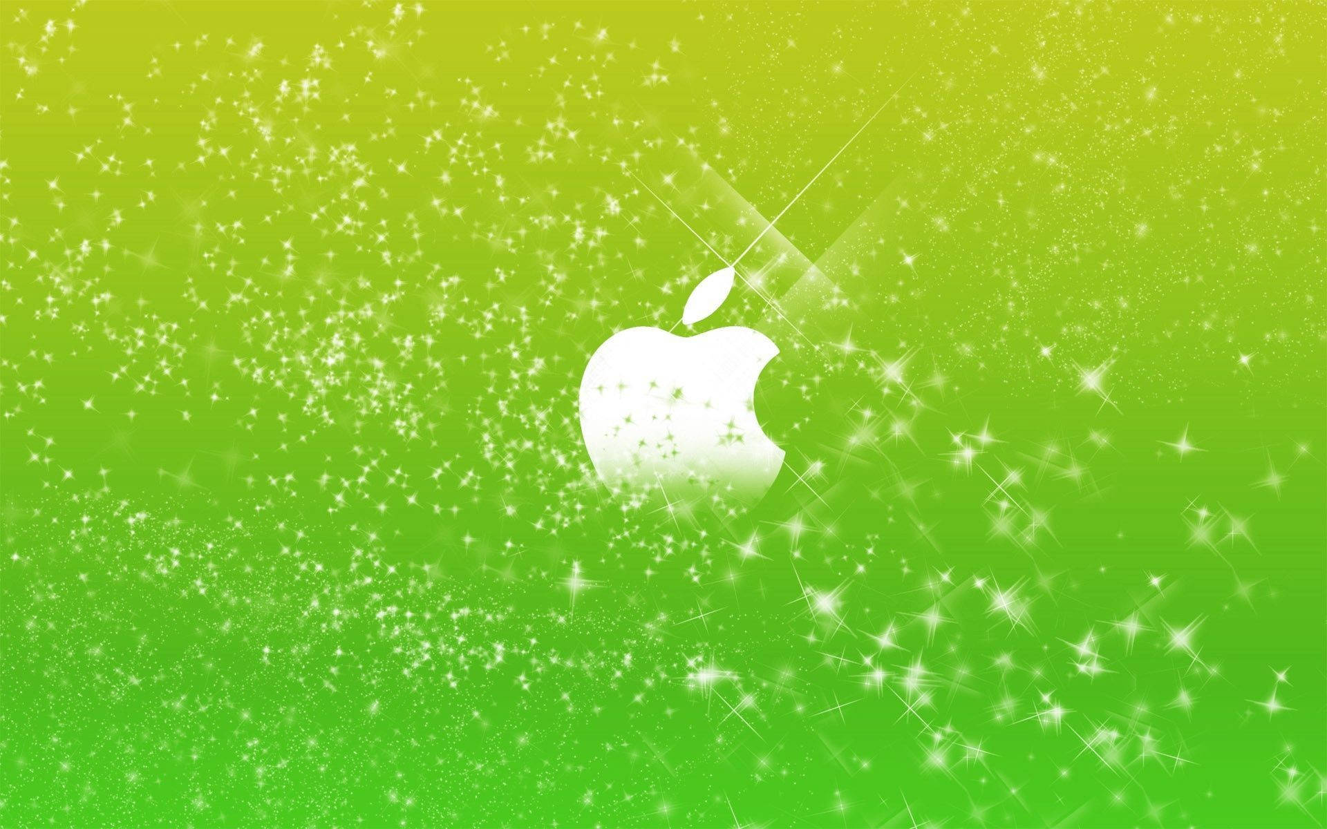 Download Apple In Green Sparkle Background Wallpaper