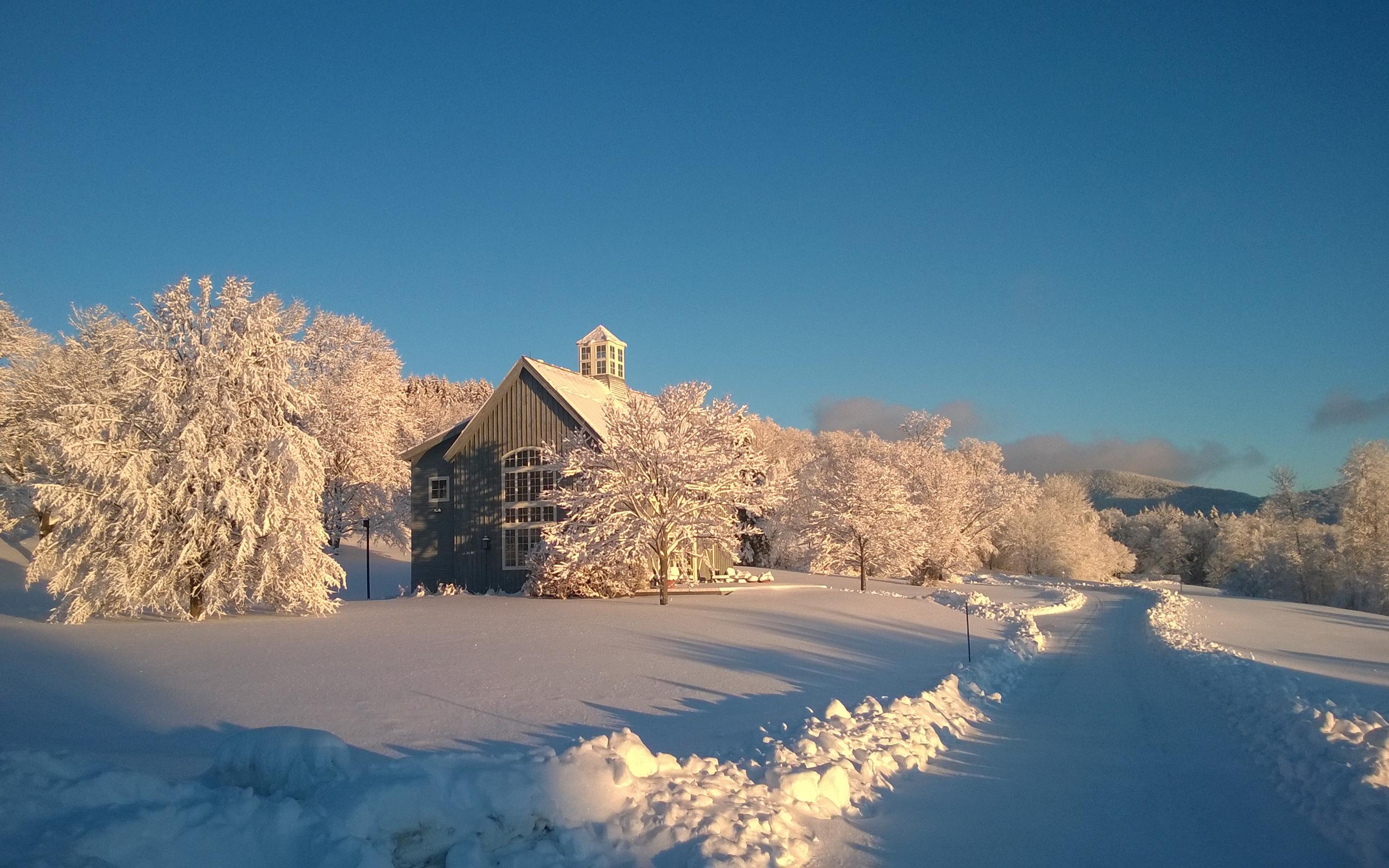 Road in the snow and a beautiful winter landscape