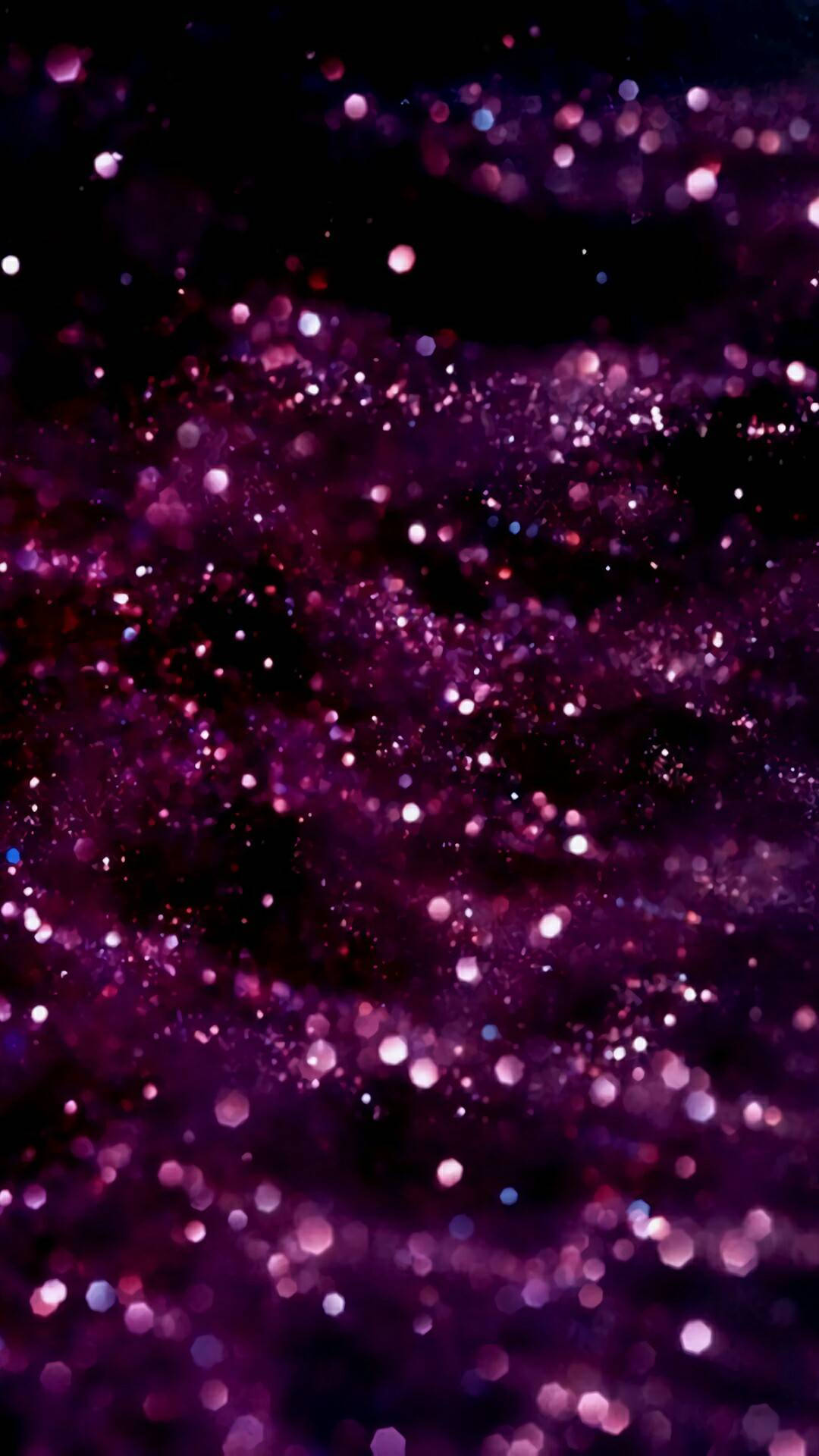 Download Scattered Pink And Purple Glitter Black Backdrop Wallpaper