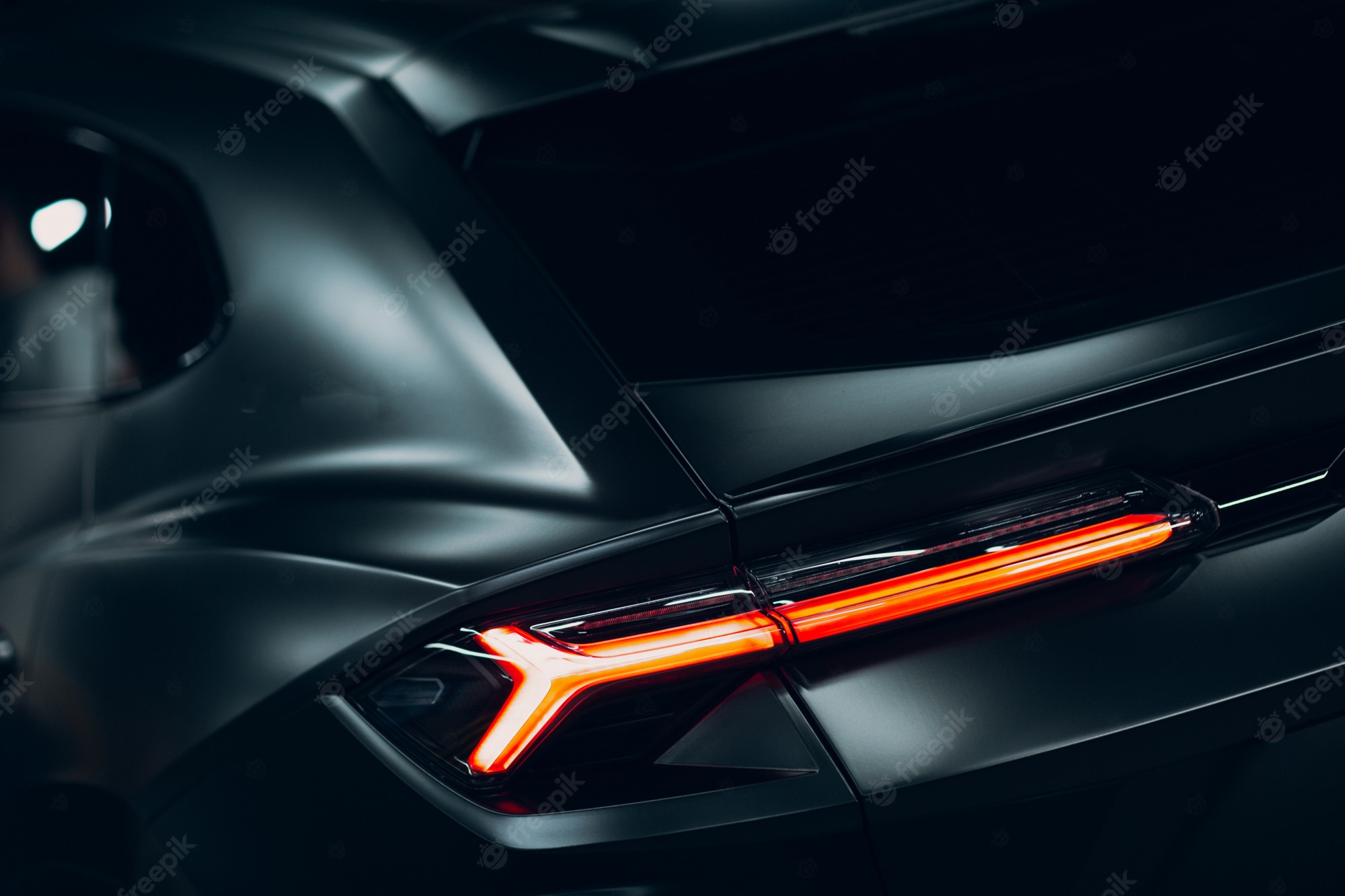 Premium Photo. Lamborghini urus black sport car. sports cars street race