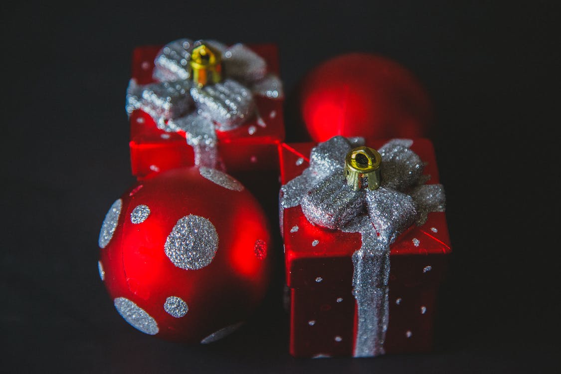 Close Up Photo Of Red And Silver Christmas Decorations · Free