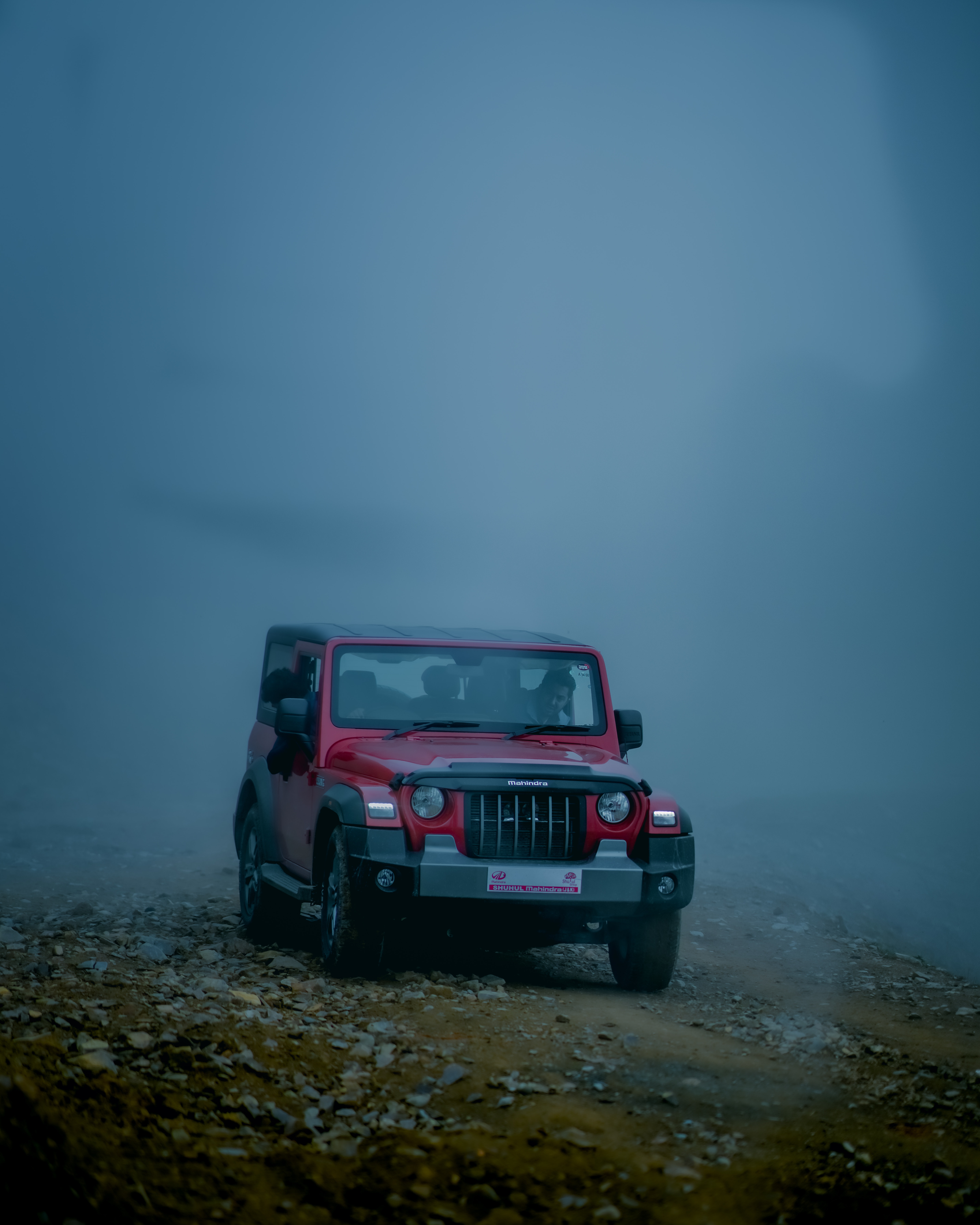 A Red Mahindra Thar on Dirt Road · Free