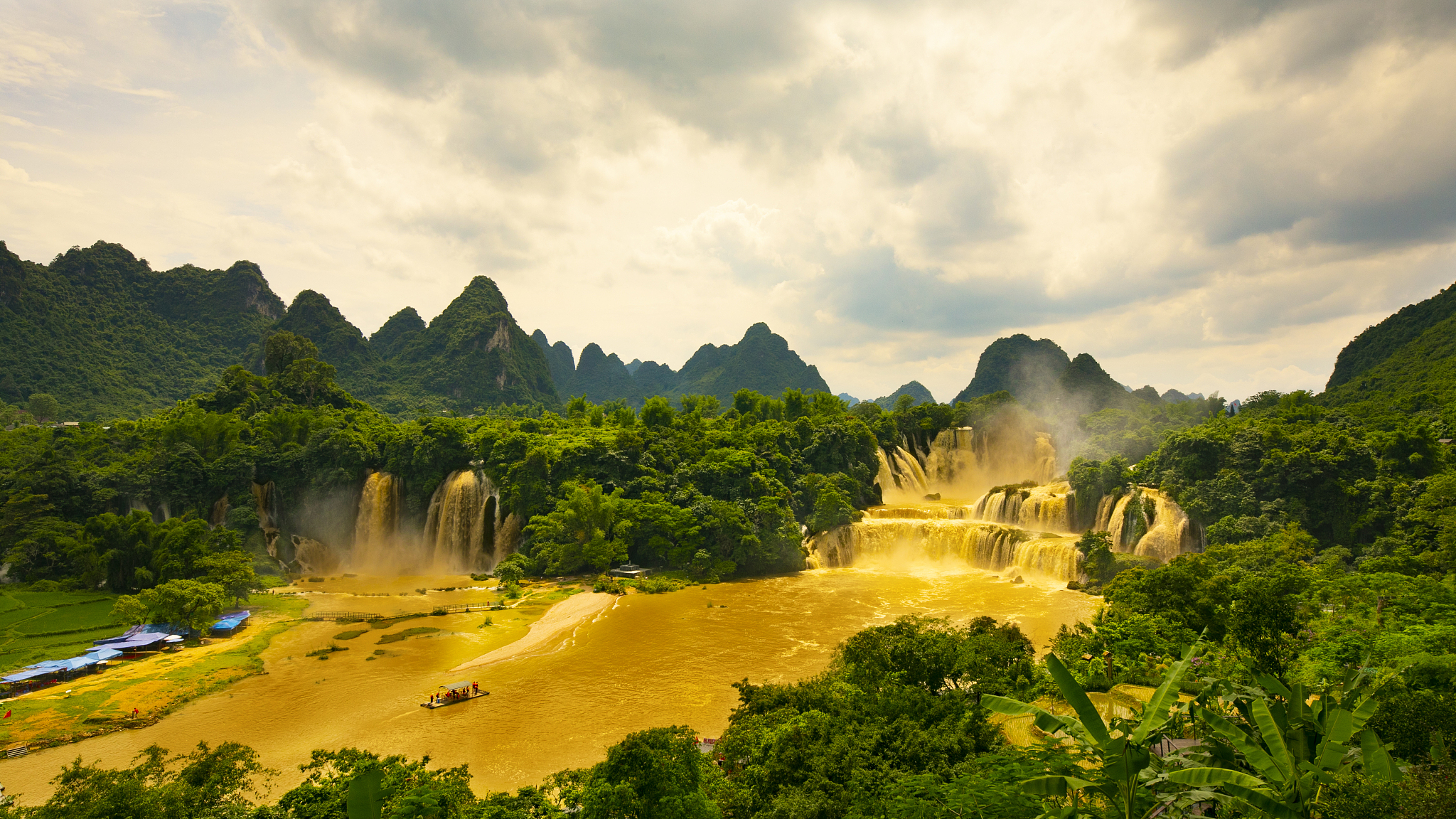 Asia's Largest Cross Border Waterfall Turns Golden