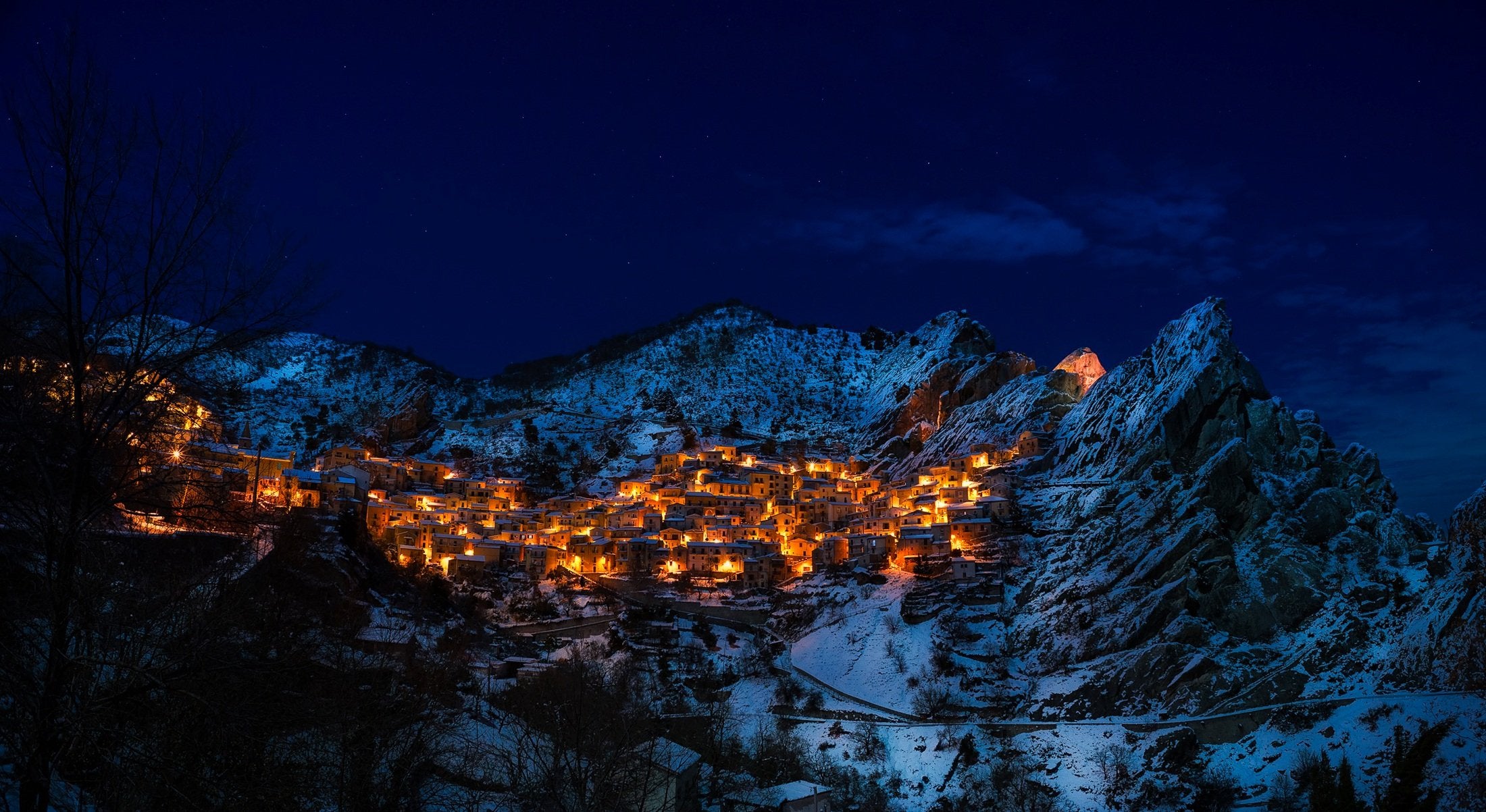 City lights on mountain during night time [2200×1203]