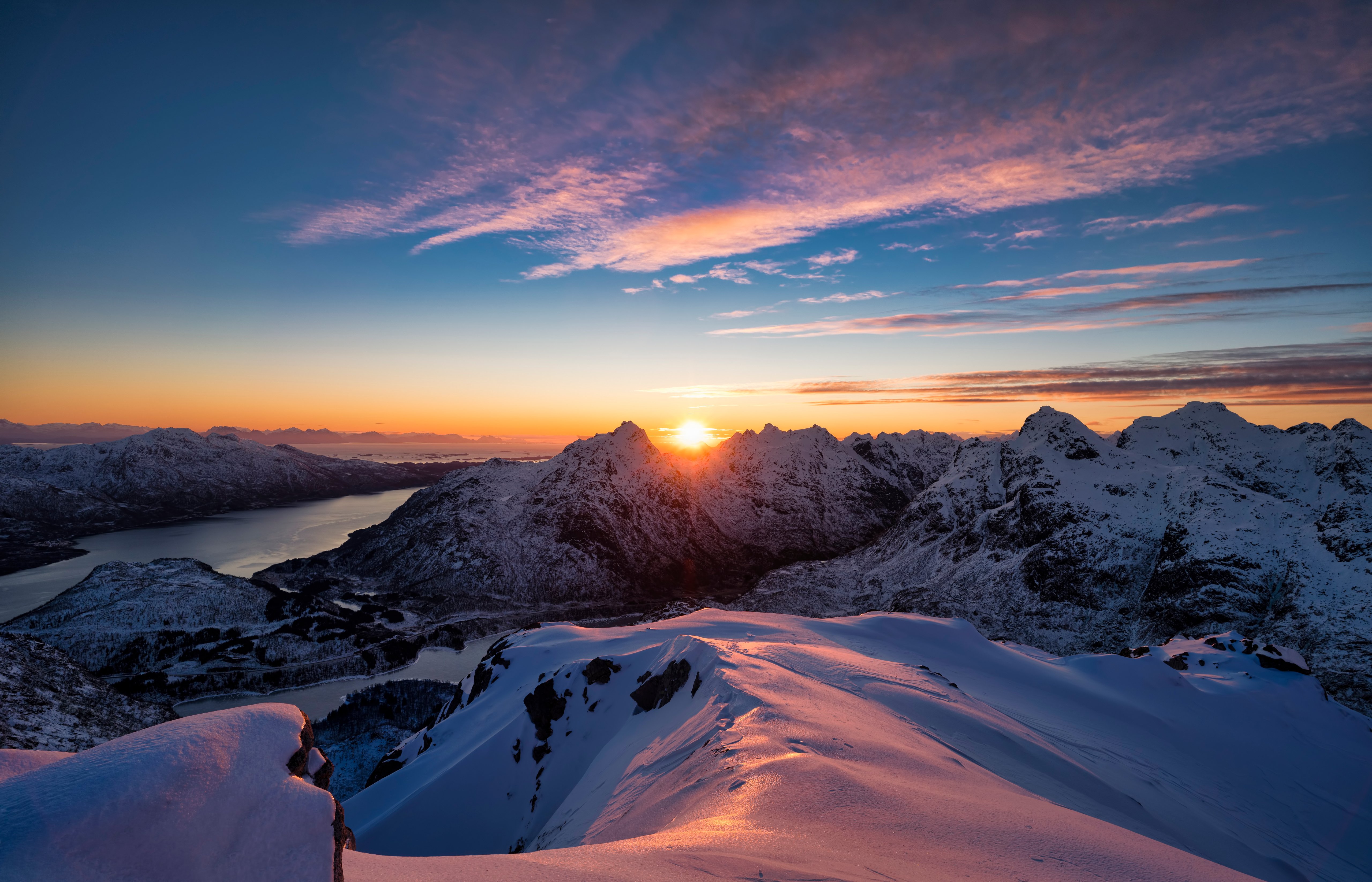 Sunset in snowy mountains Wallpaper 5k Ultra HD