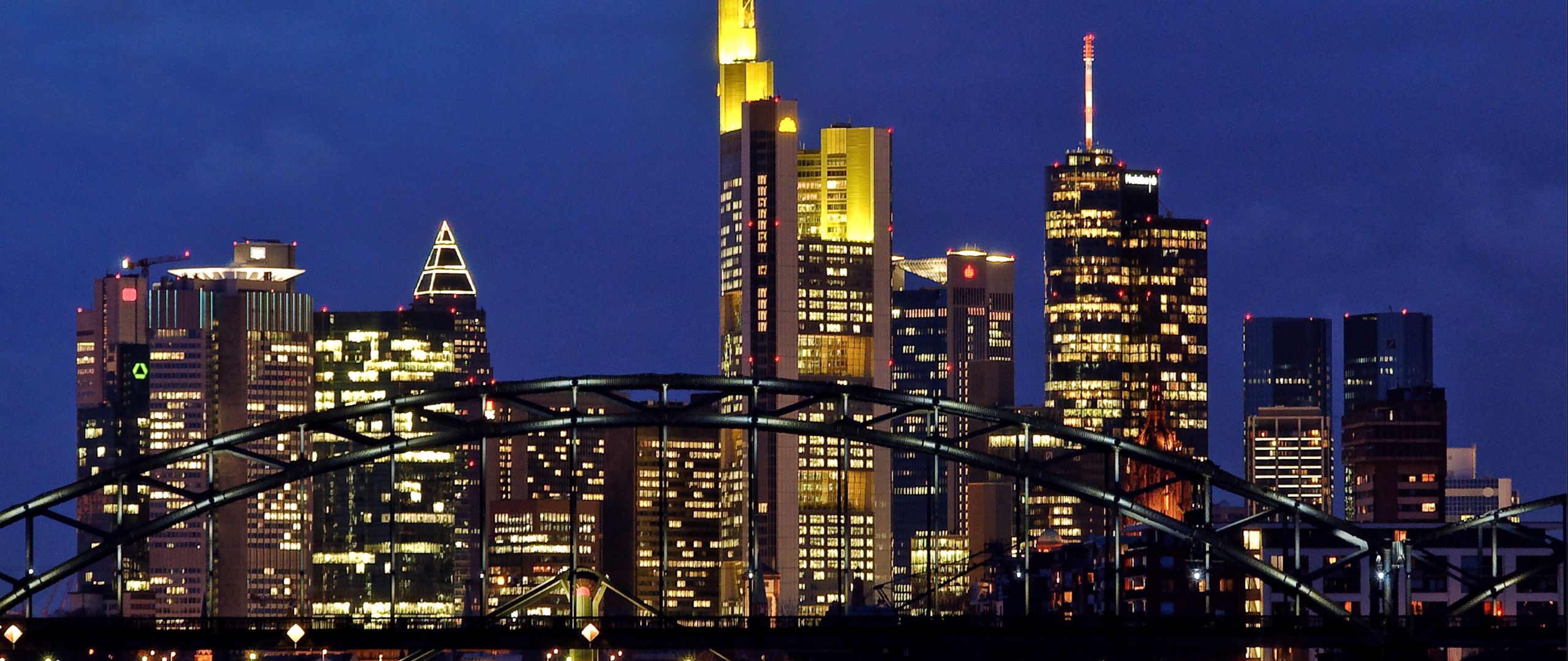 Download wallpaper 2560x1080 germany, frankfurt am main, evening, metropolis, skyscrapers, lights, bridge, river dual wide 1080p HD background