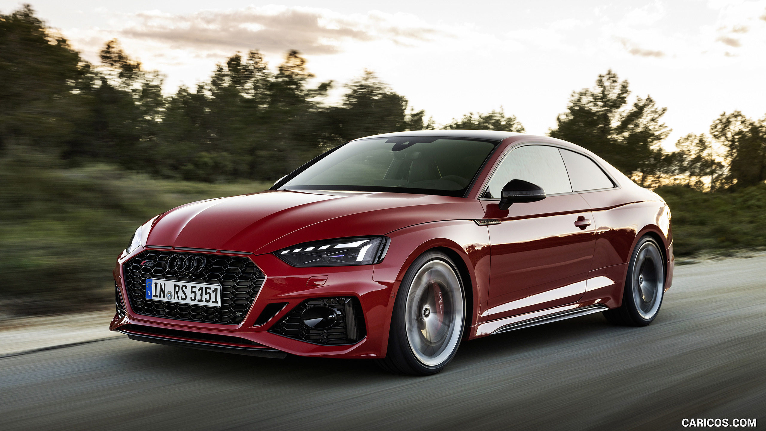 2023 Audi RS 5 Coupé Competition Plus (Color: Tango Red) Three Quarter