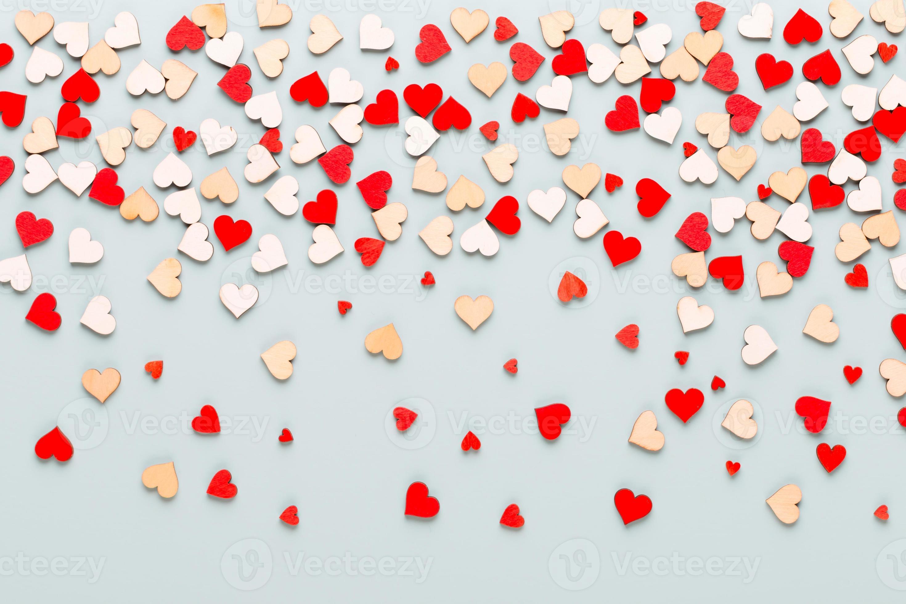 Happy Valentines day background, small hearts on pastel background