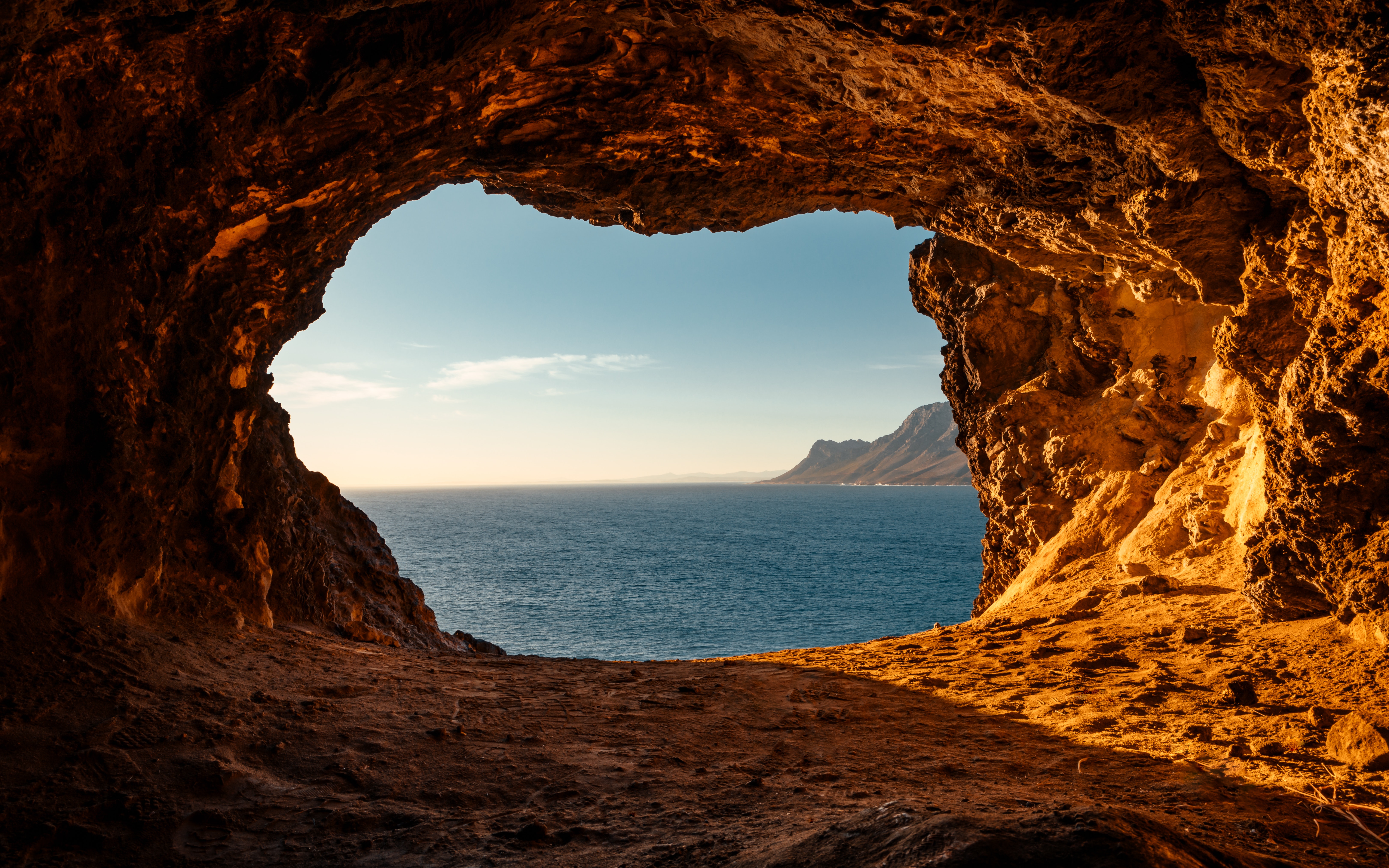 Photo of a Cave Near an Ocean · Free