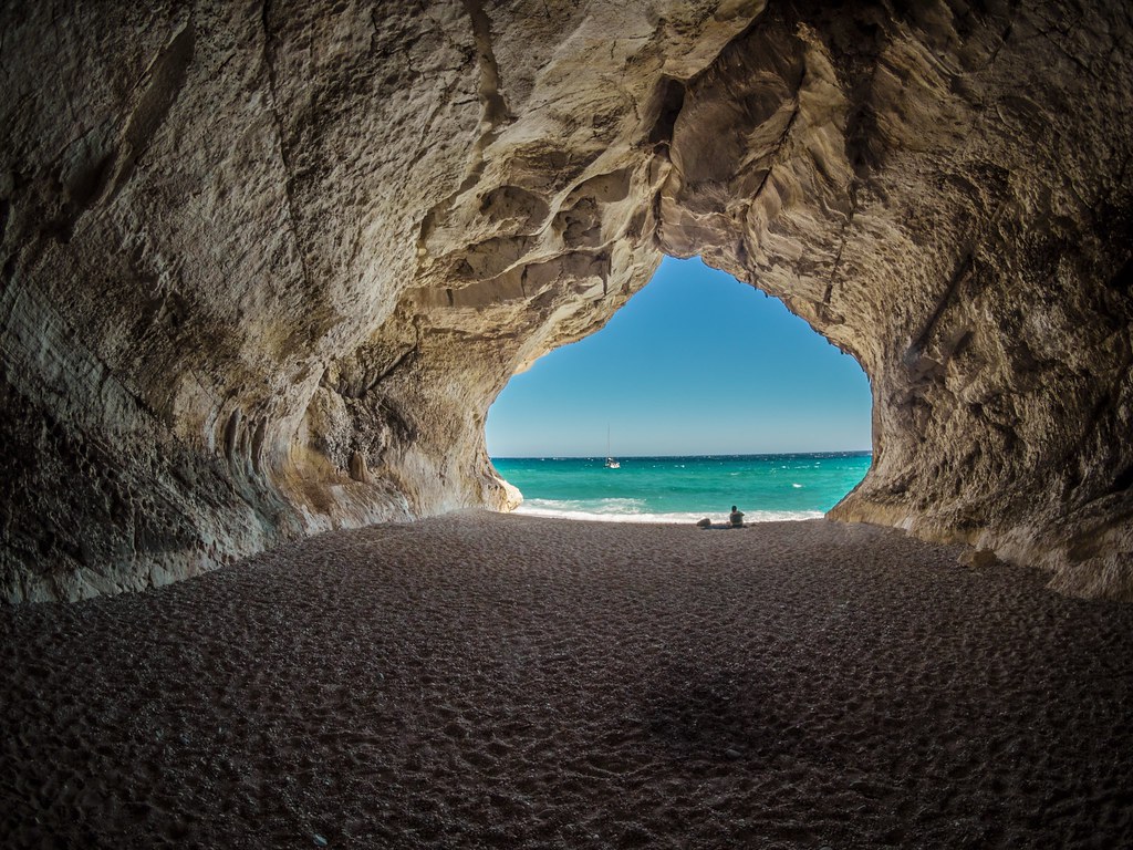 beach view from cave HD wallpaper. Download this Wallpaper