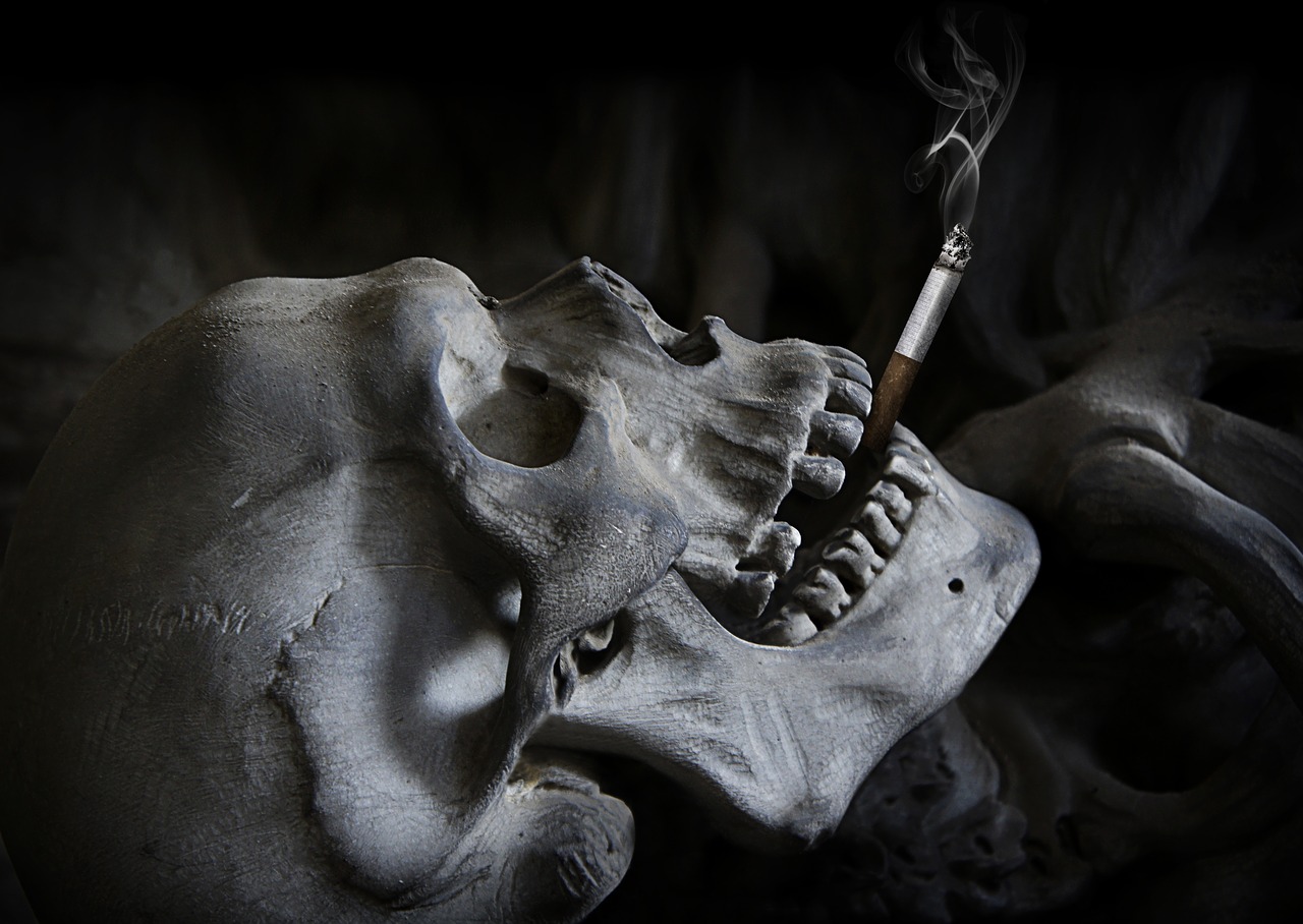 Download free photo of Skull, cigarette, death, skull and crossbones, halloween