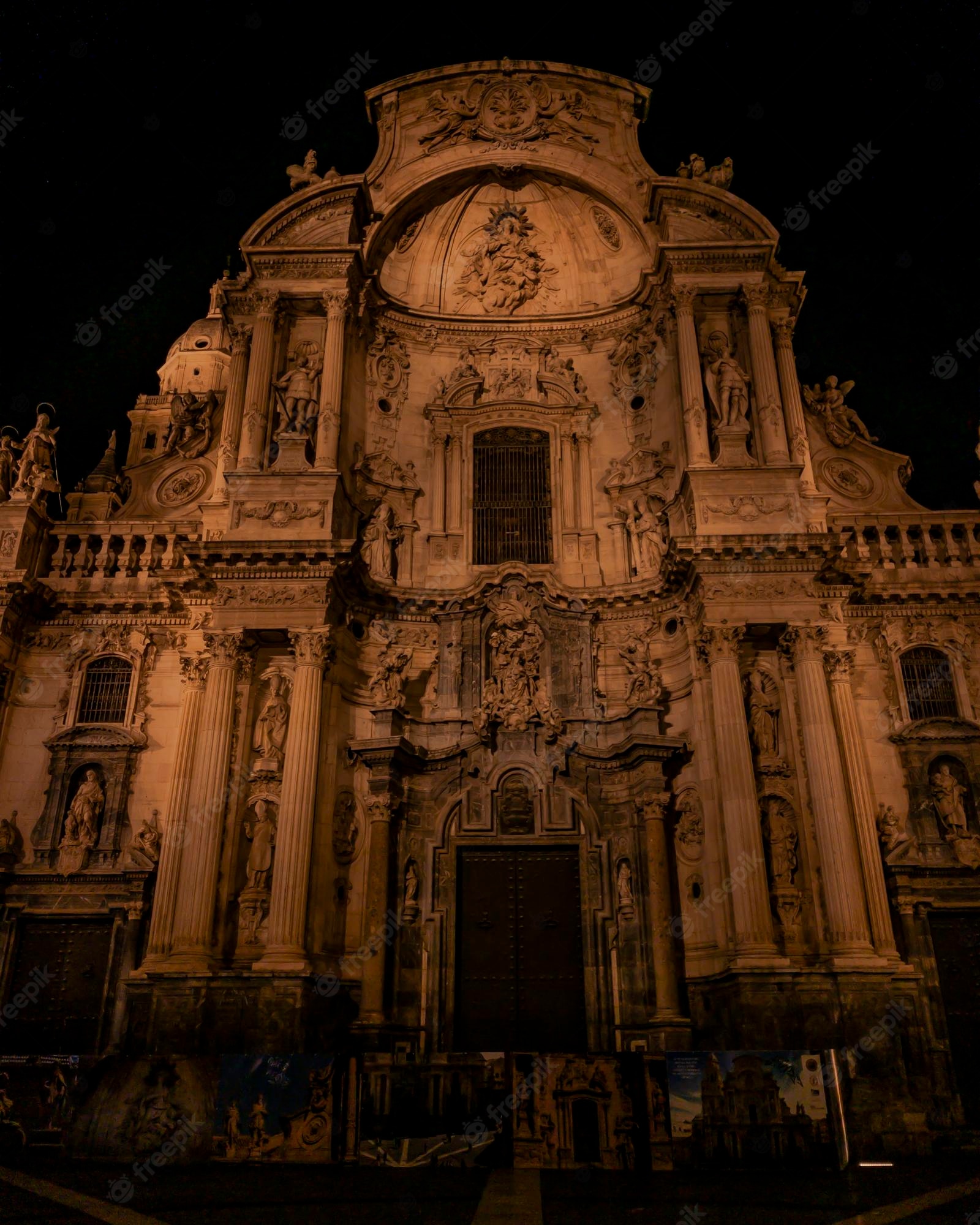 Premium Photo. Murcia cathedral illuminated at night wallpaper