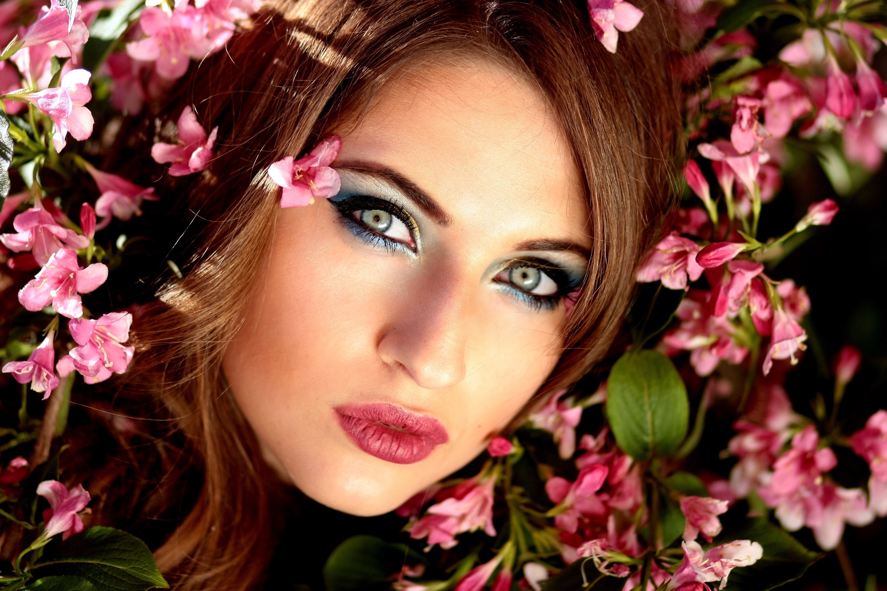 Wallpaper / girl flowers pink blue eyes beauty spring 4k wallpaper free download