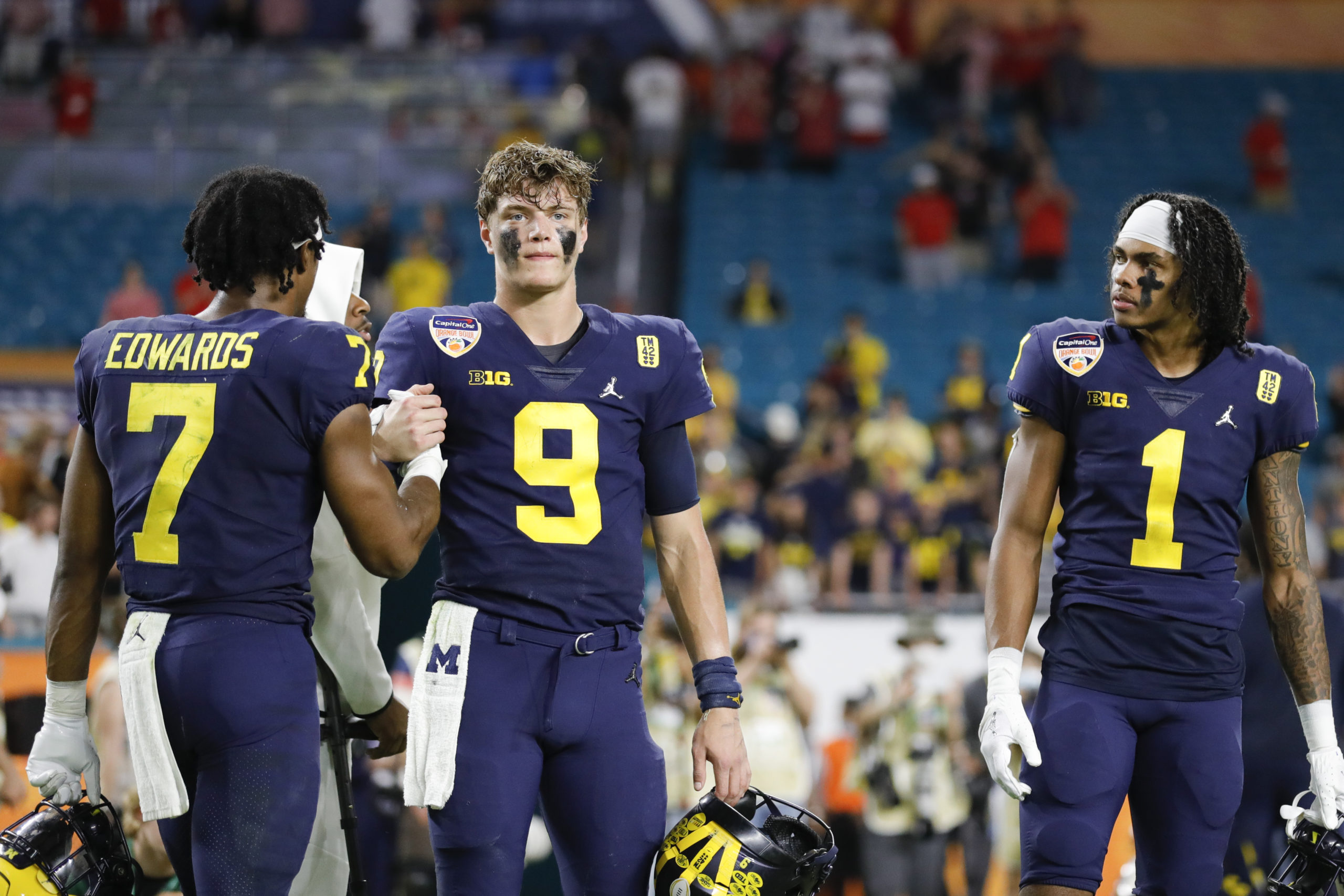 J.J. McCarthy reacts to Jim Harbaugh's interest in the NFL, his Michigan future