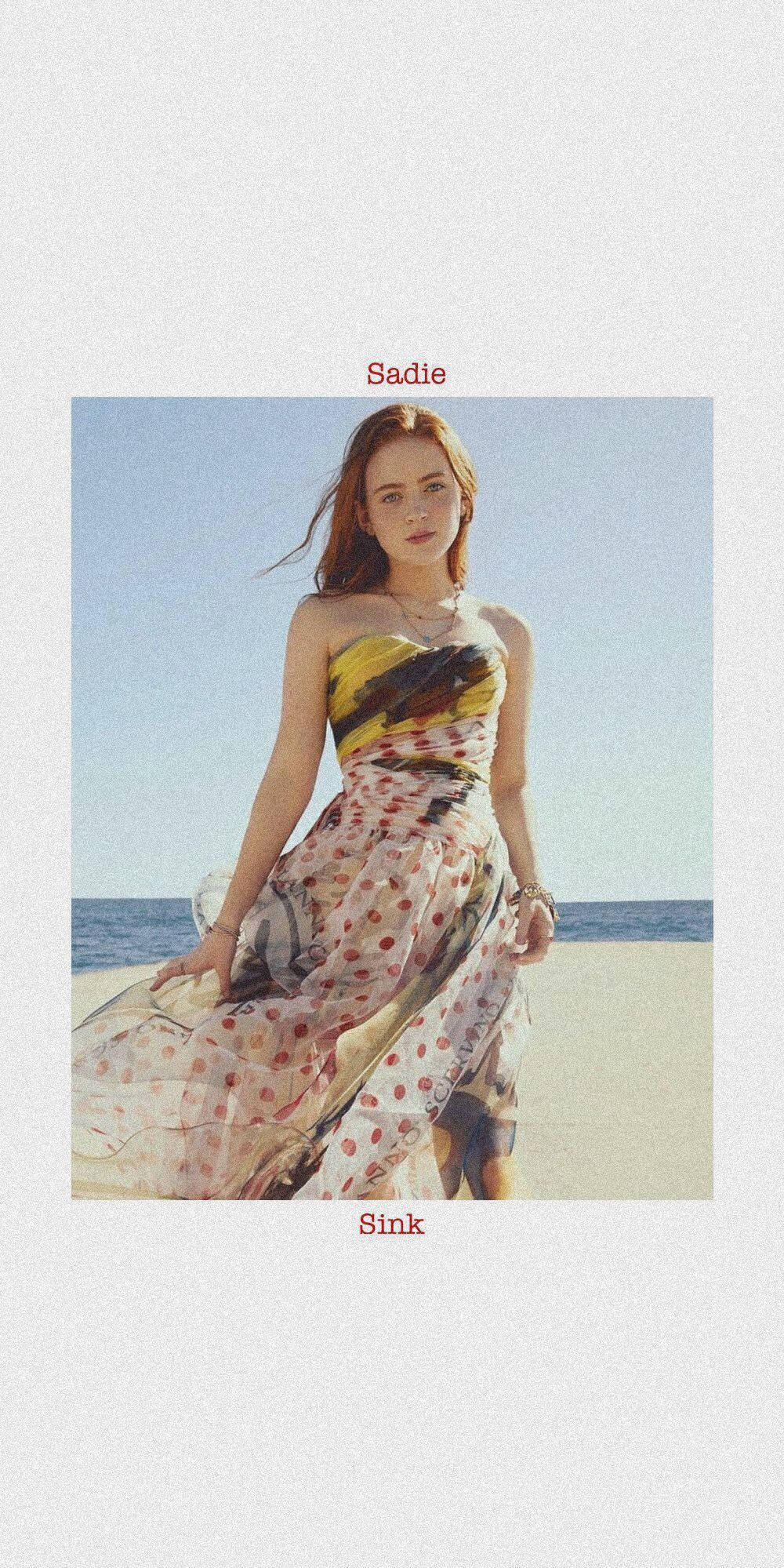 Download Sadie Sink On The Beach Wallpaper