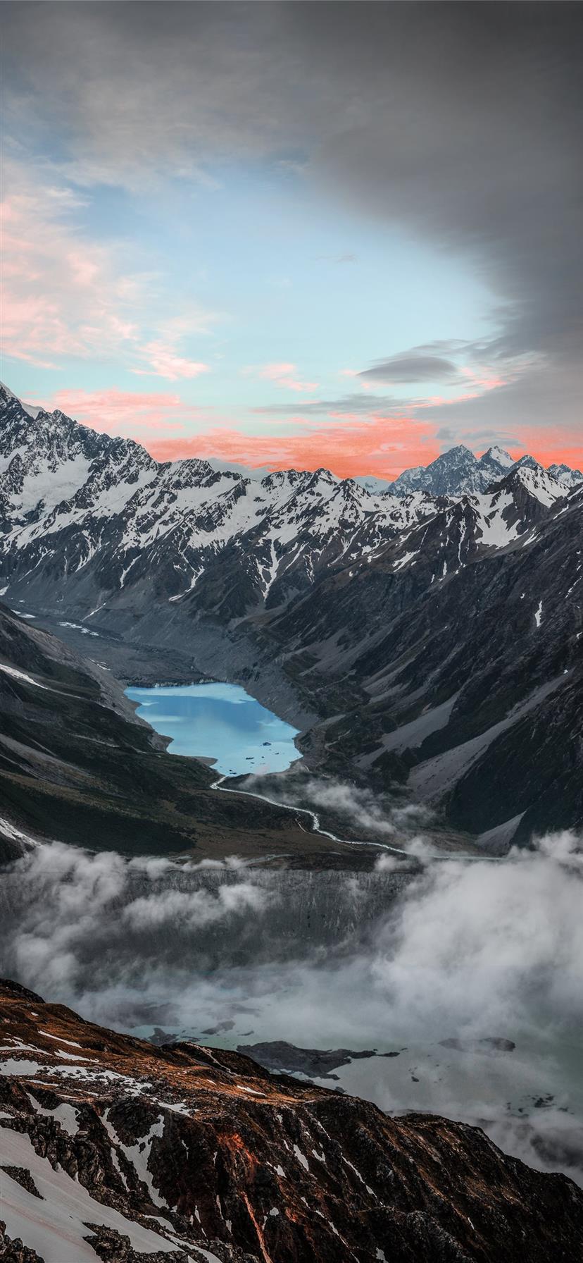 rock mountain covered by snow iPhone X
