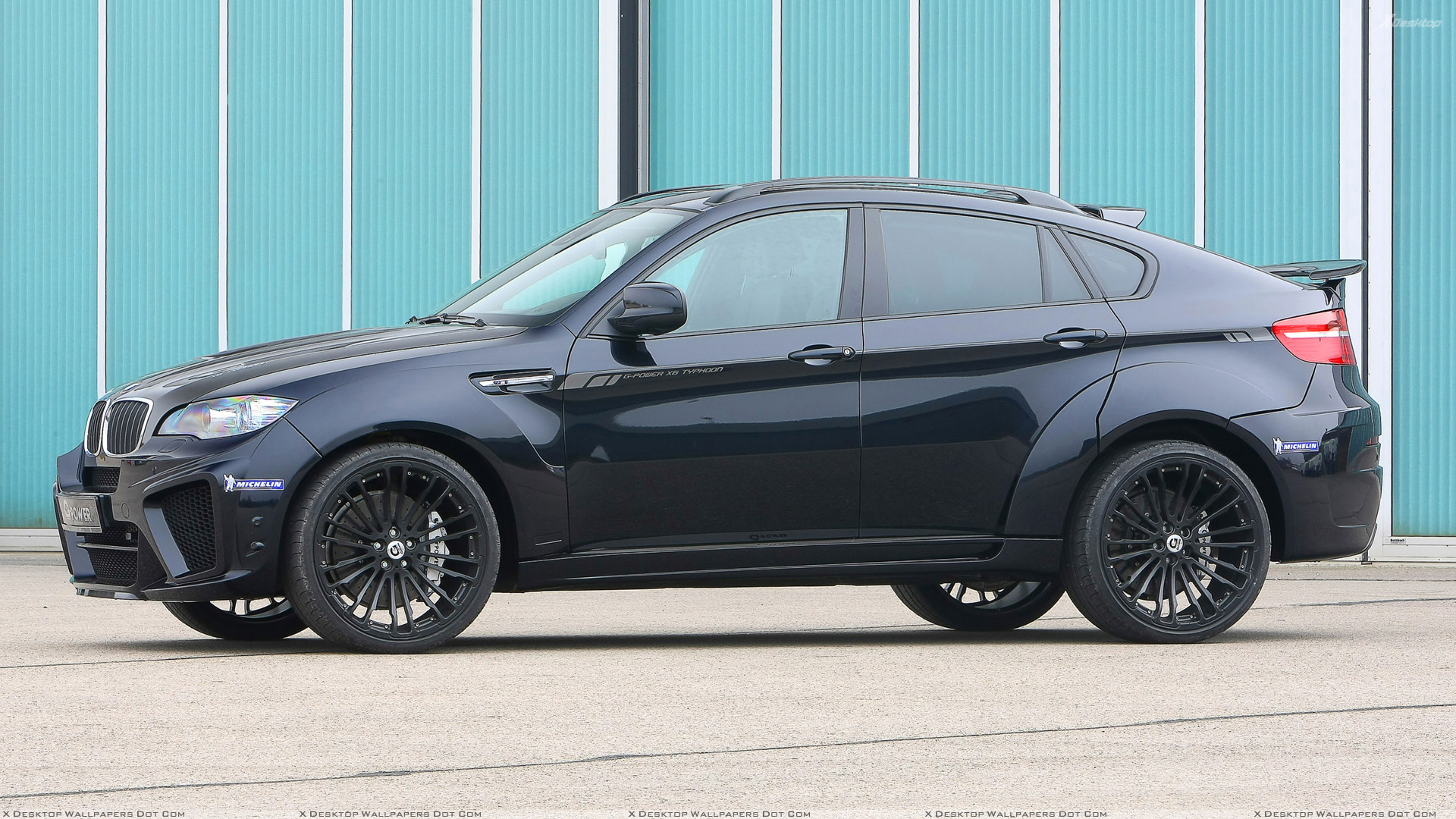 Side Pose Of G Power BMW X6 M Typhoon Wide Body In Black Wallpaper