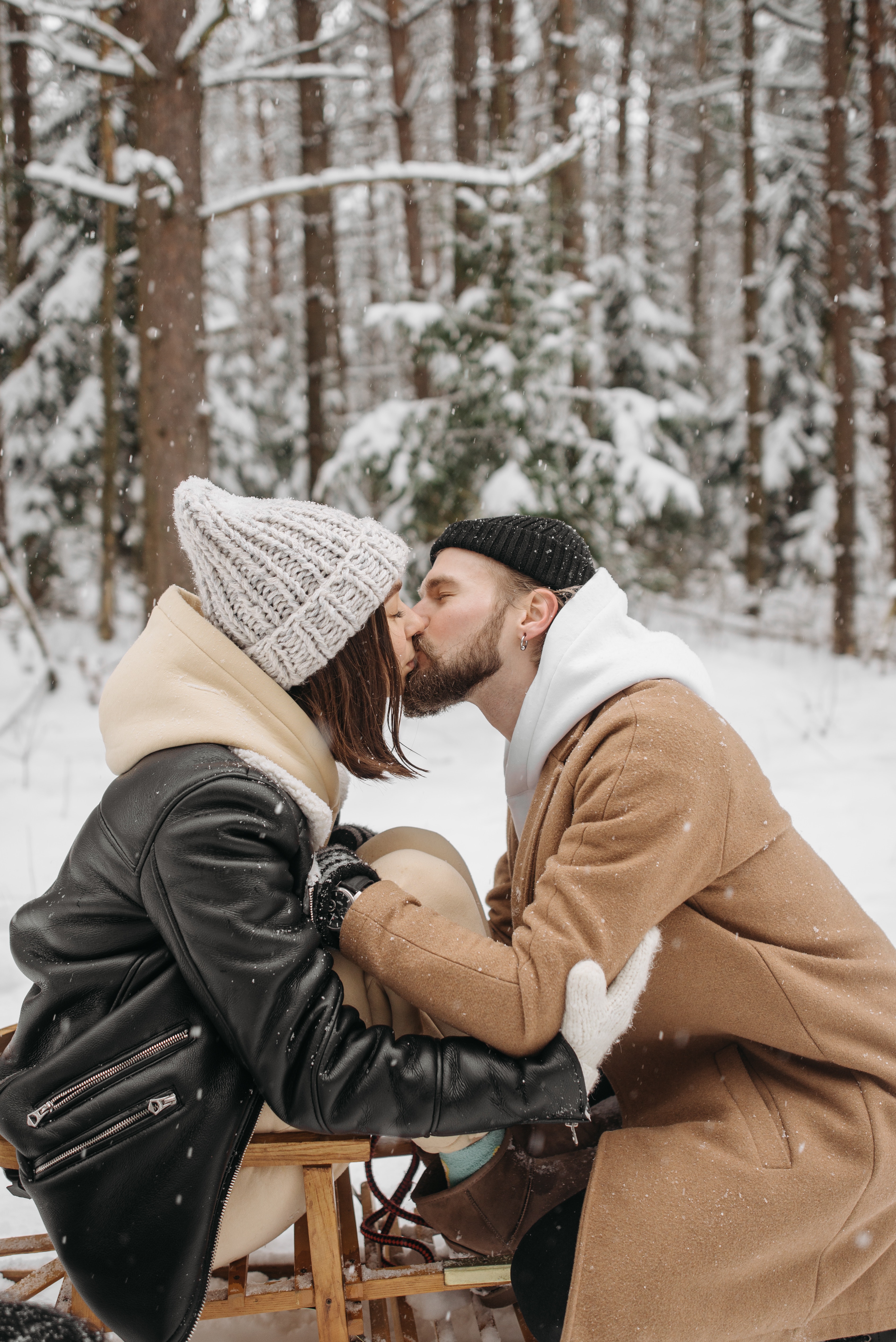 A Couple Kissing Each Other during Winter · Free