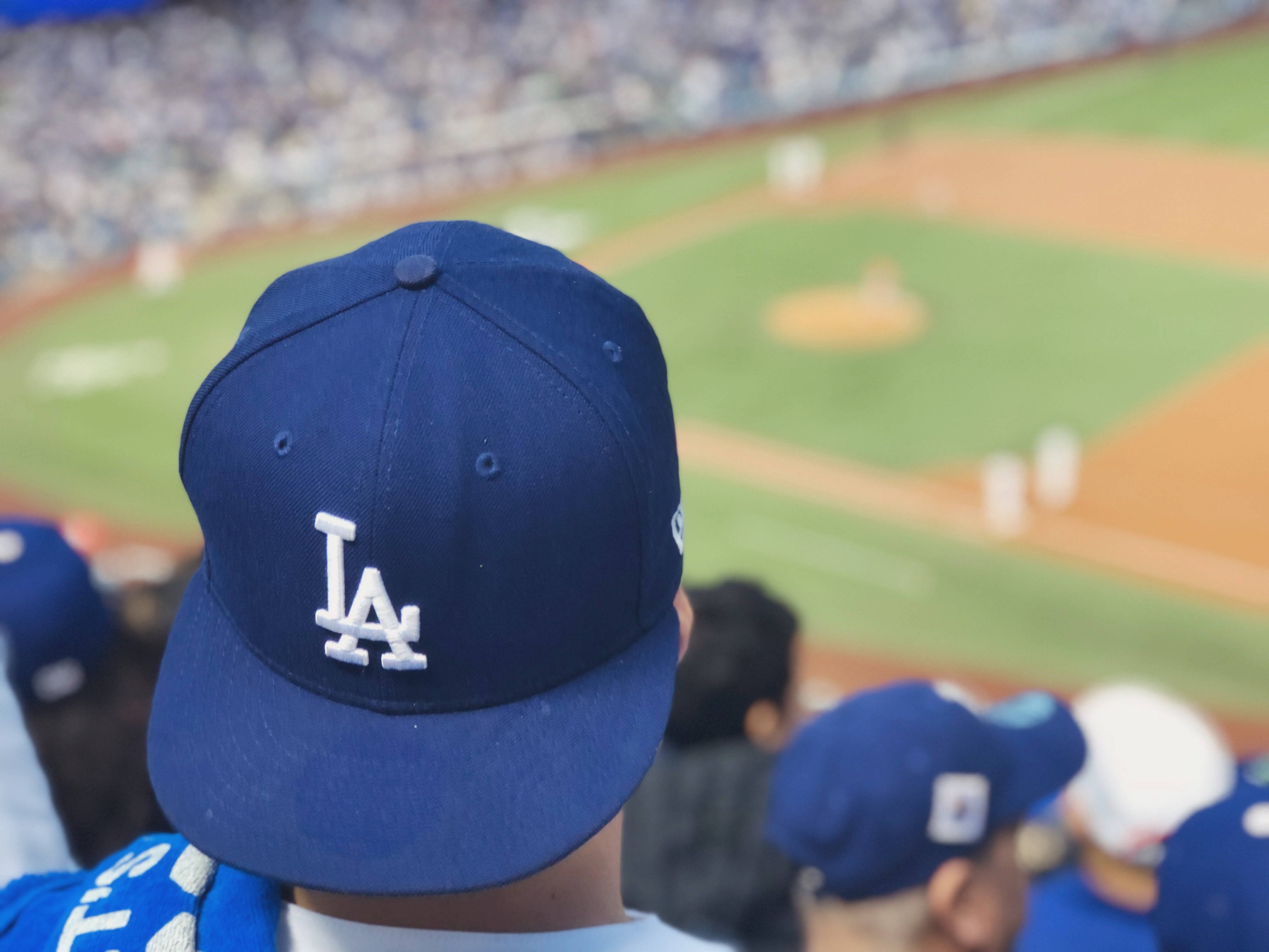 Download Man Wearing Mlb Dodgers Cap Wallpaper
