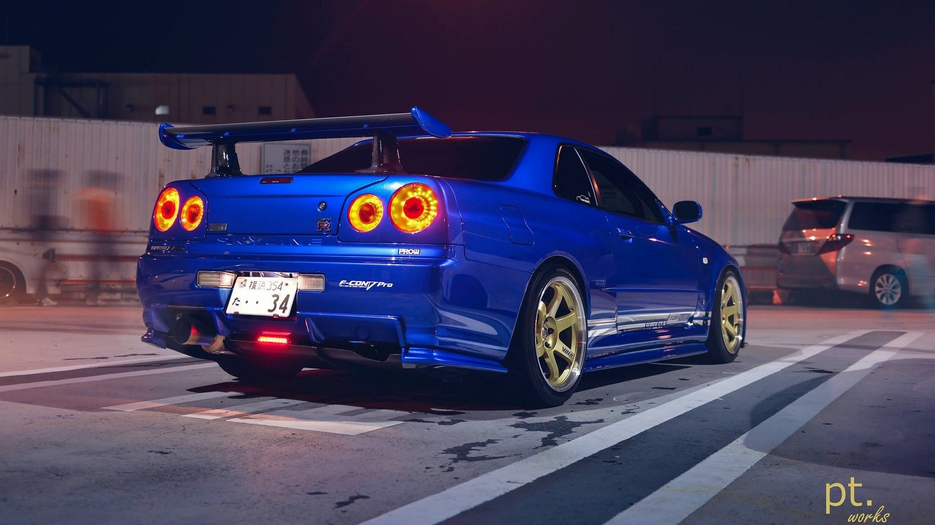 Wallpaper / Nissan Skyline GT R R34, JDM, Japanese Cars, Nissan Skyline GT R, Nissan, Blue Cars, Sports Car, Night, Car, Vehicle, Outdoors, Taillights Free Download